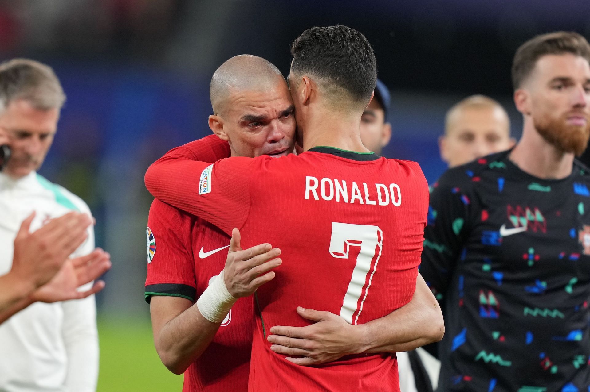 Pepe (facing) and Cristiano Ronaldo