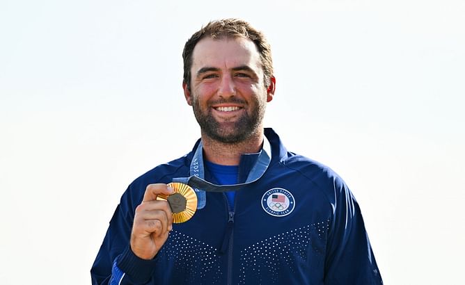 WATCH: Scottie Scheffler in tears on the podium after winning gold in golf at the 2024 Olympics