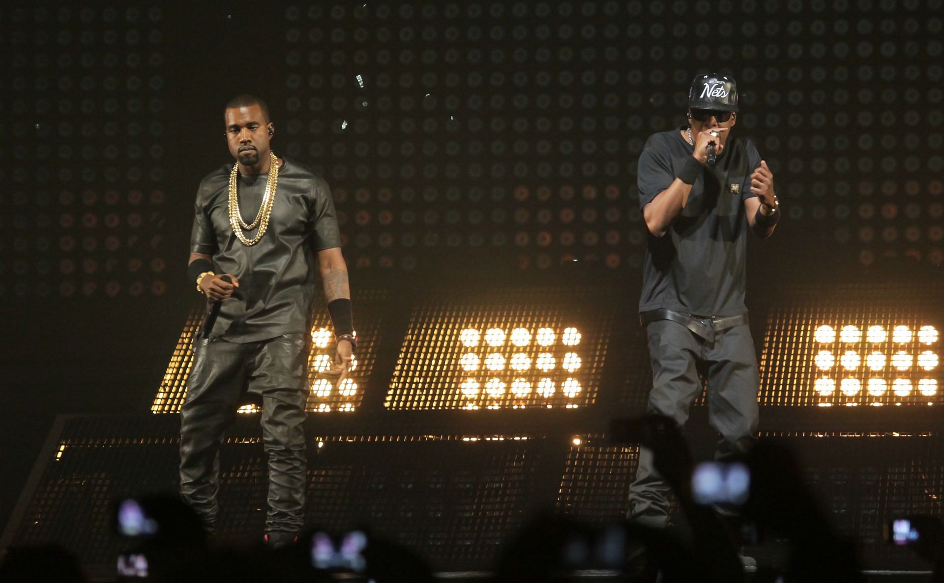 Jay-Z and Kanye West perform during the Watch The Throne Tour in Antwerp, Belgium, on June 3, 2012. (Image via Getty/Pieter-Jan Vanstockstraeten)