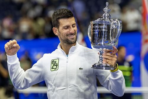 Novak Djokovic with the trophy after winning the US Open in 2023