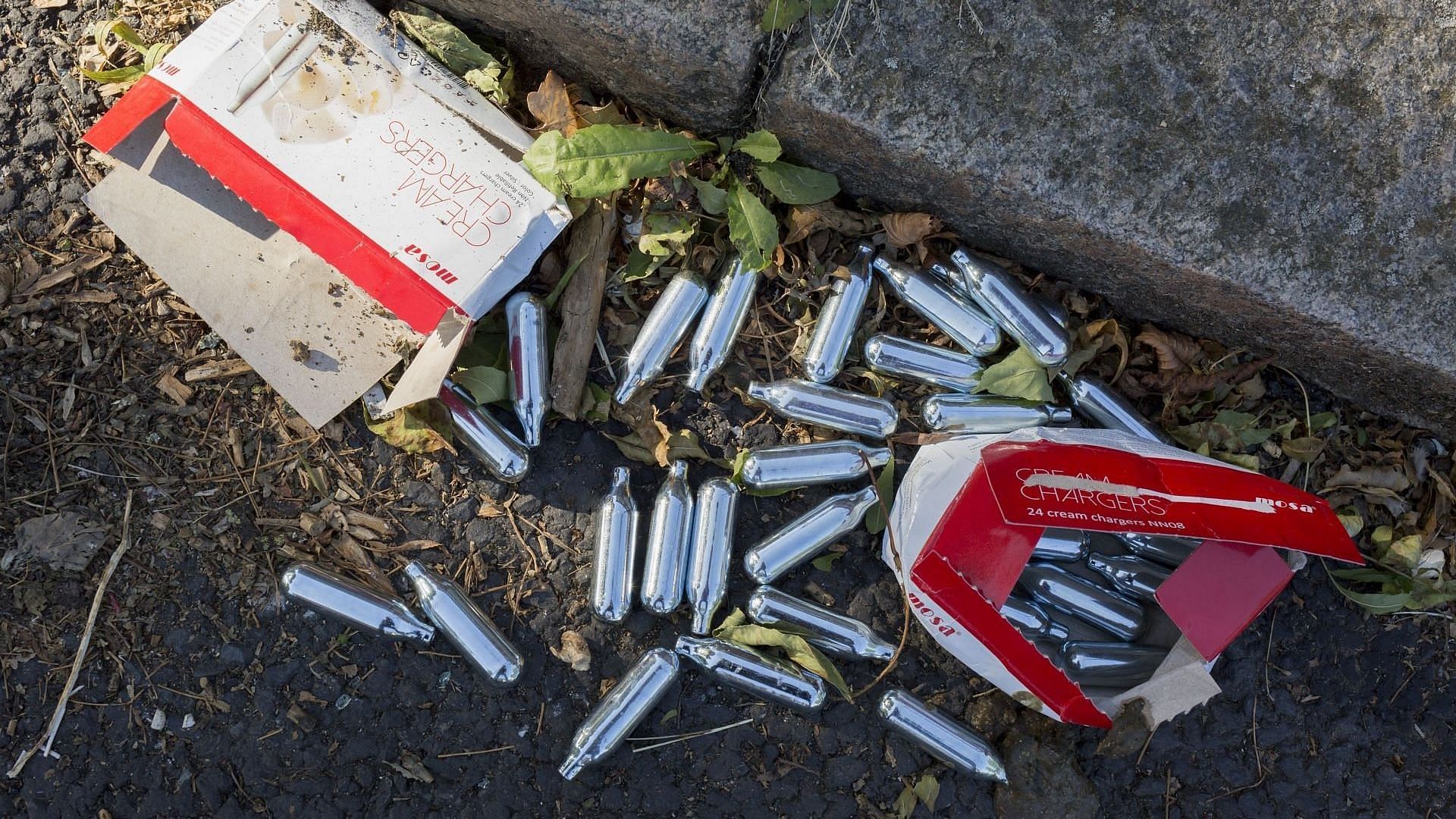 Nitrous oxide Mosa cream charger canisters lie in the gutter of a surburban south London street, on 2nd September 2019, in London, England. (Photo by Richard Baker / In Pictures via Getty Images)