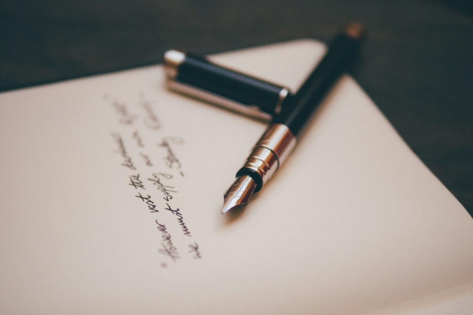 Pen and Paper (Image via Unsplash)