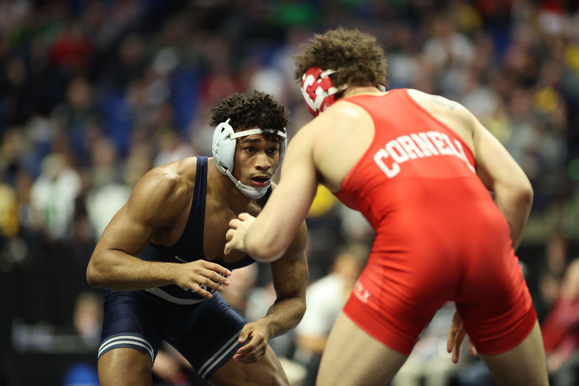 Carter Starocci (blue) against Chris Foca (red) during the Division I Mens Wrestling Championship in 2023. (Photo by Shane Bevel/NCAA Photos via Getty Images)