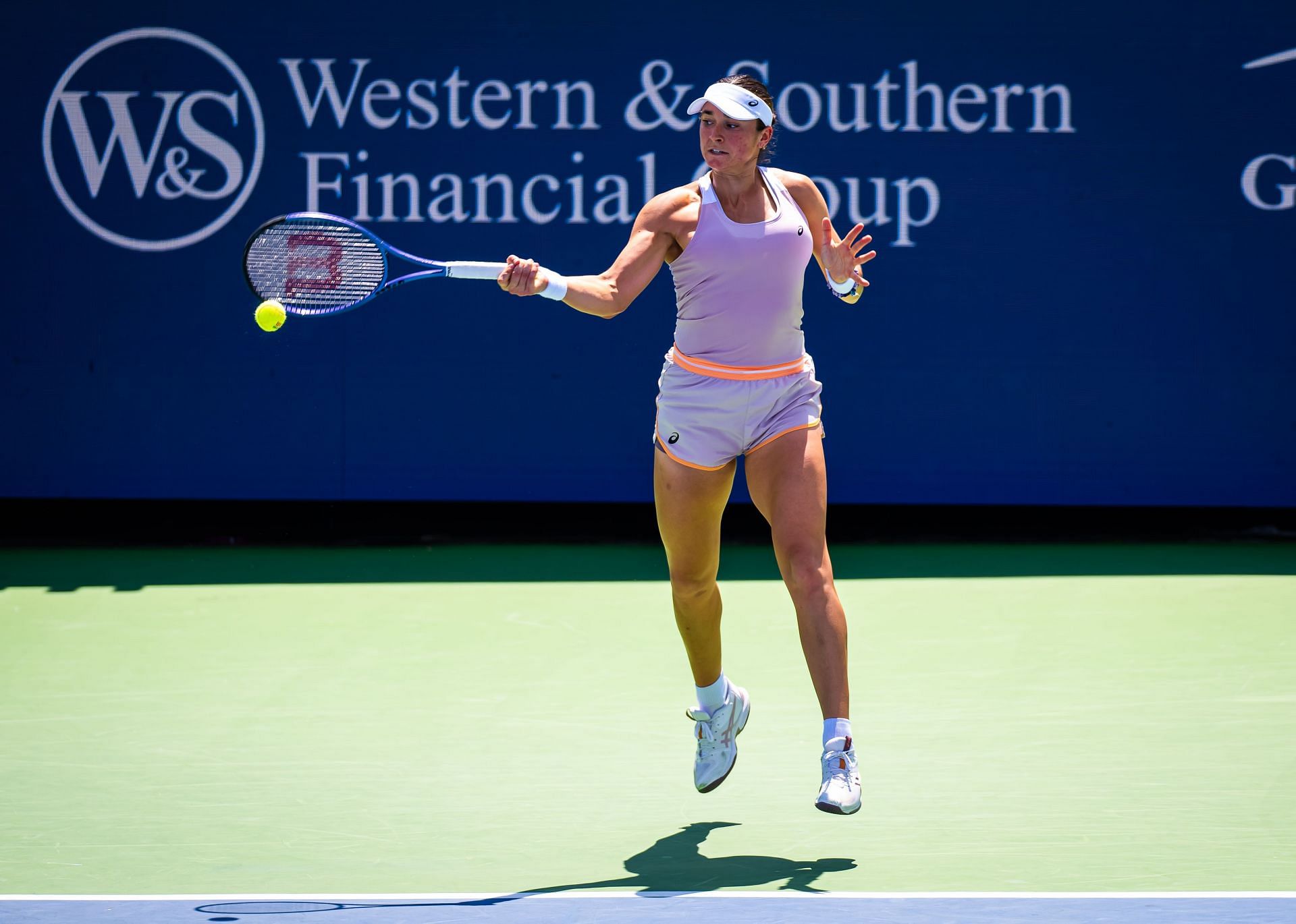 Caroline Dolehide hits a forehand. (Getty)