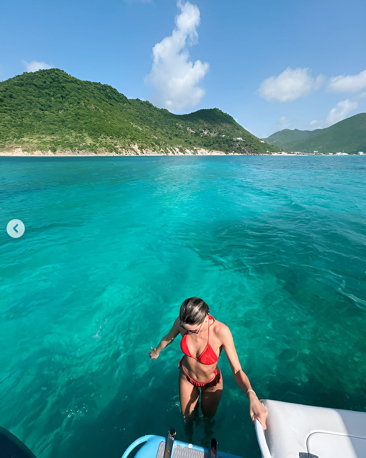 Gianna Tulio in a red two-piece swimsuit at Marigot, St. Martin (Source: @giannatulio on Instagram)