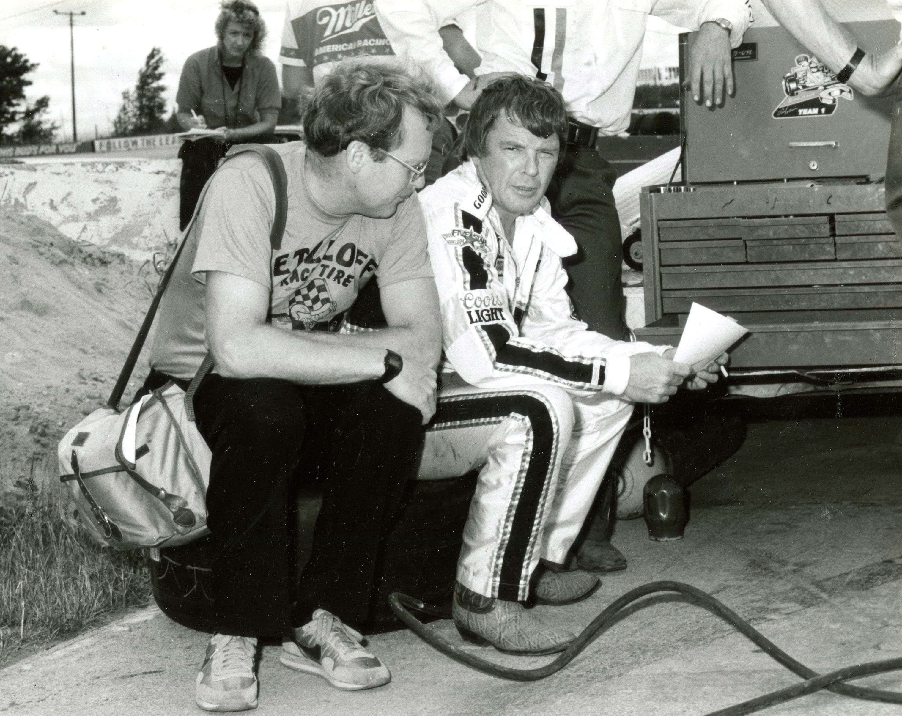 Father Dale Grubba (left) talks with stock car racer Dick Trickle prior to a race at the Wisconsin International Raceway in Kaukauna in the 1980s. Source: Imagn