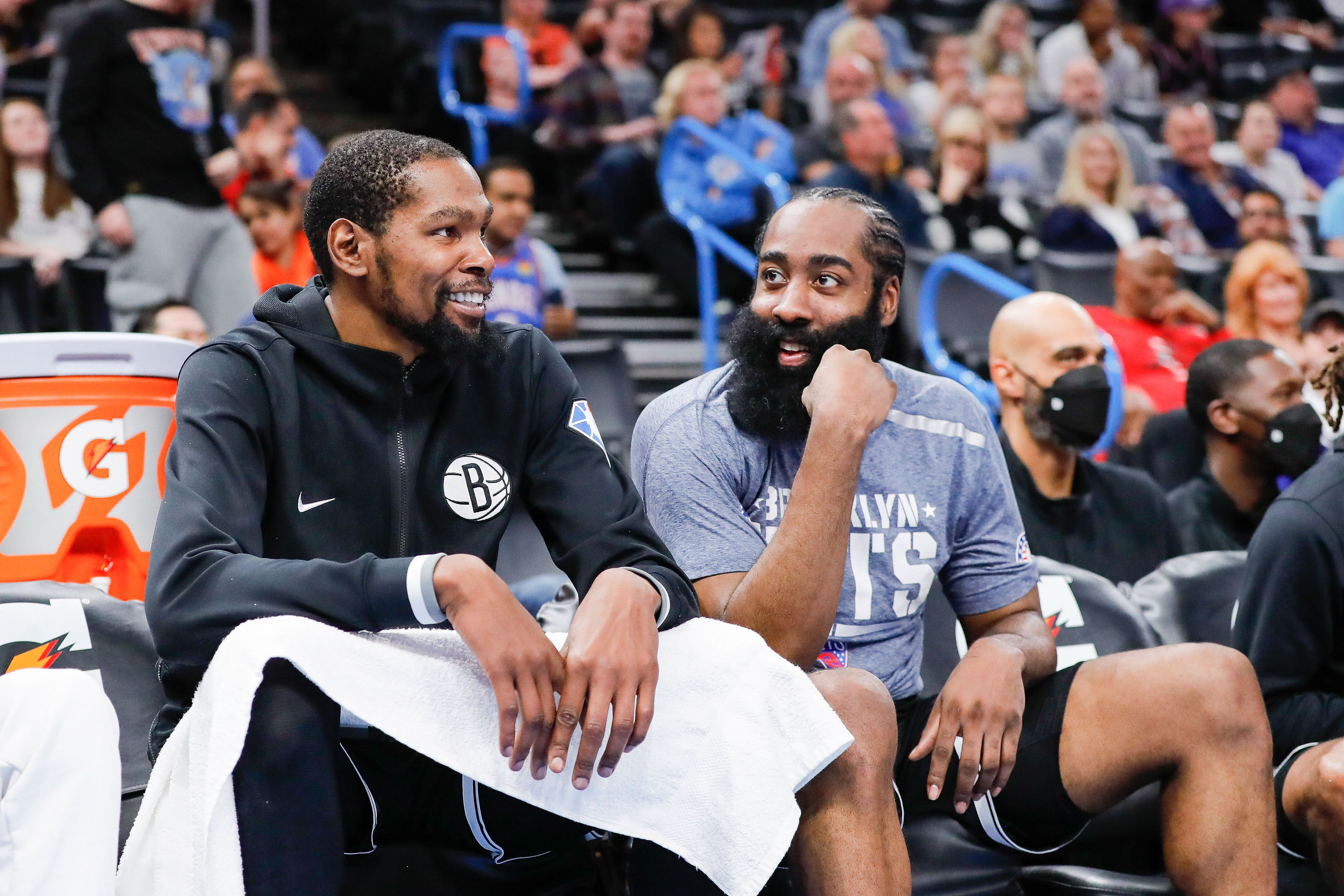 Kevin Durant and guard James Harden talk on the bench during the fourth quarter at Paycom Center. Photo Credit: Imagn