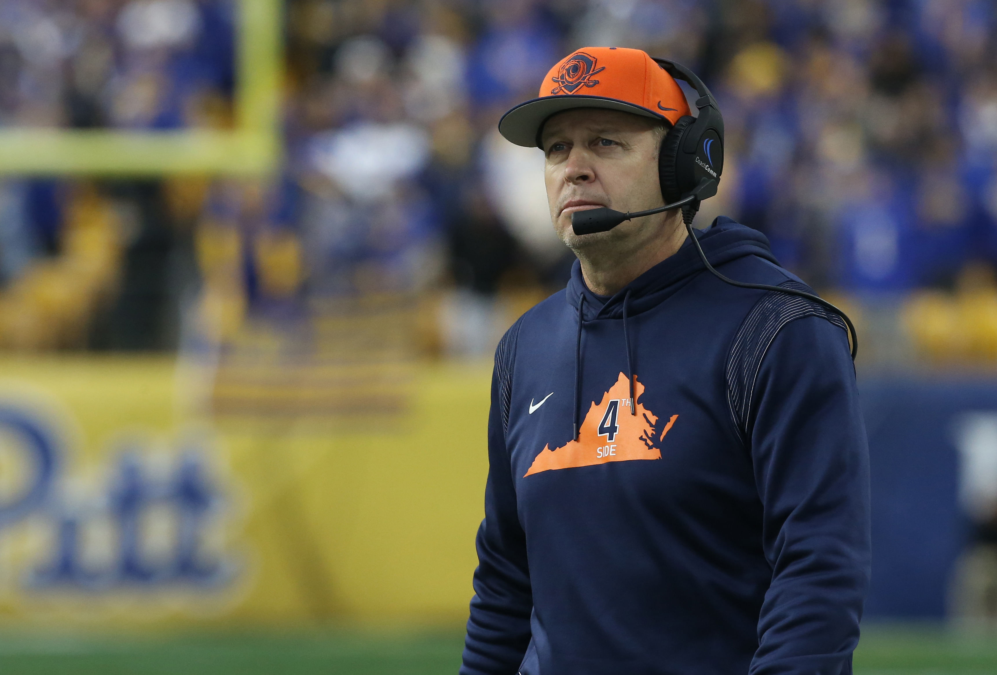 New Mexico coach Bronco Mendenhall, shown here coaching Virginia, finds his New Mexico Lobos as a 9-point week 0 underdog in his UNM debut. (Photo Credit: IMAGN)