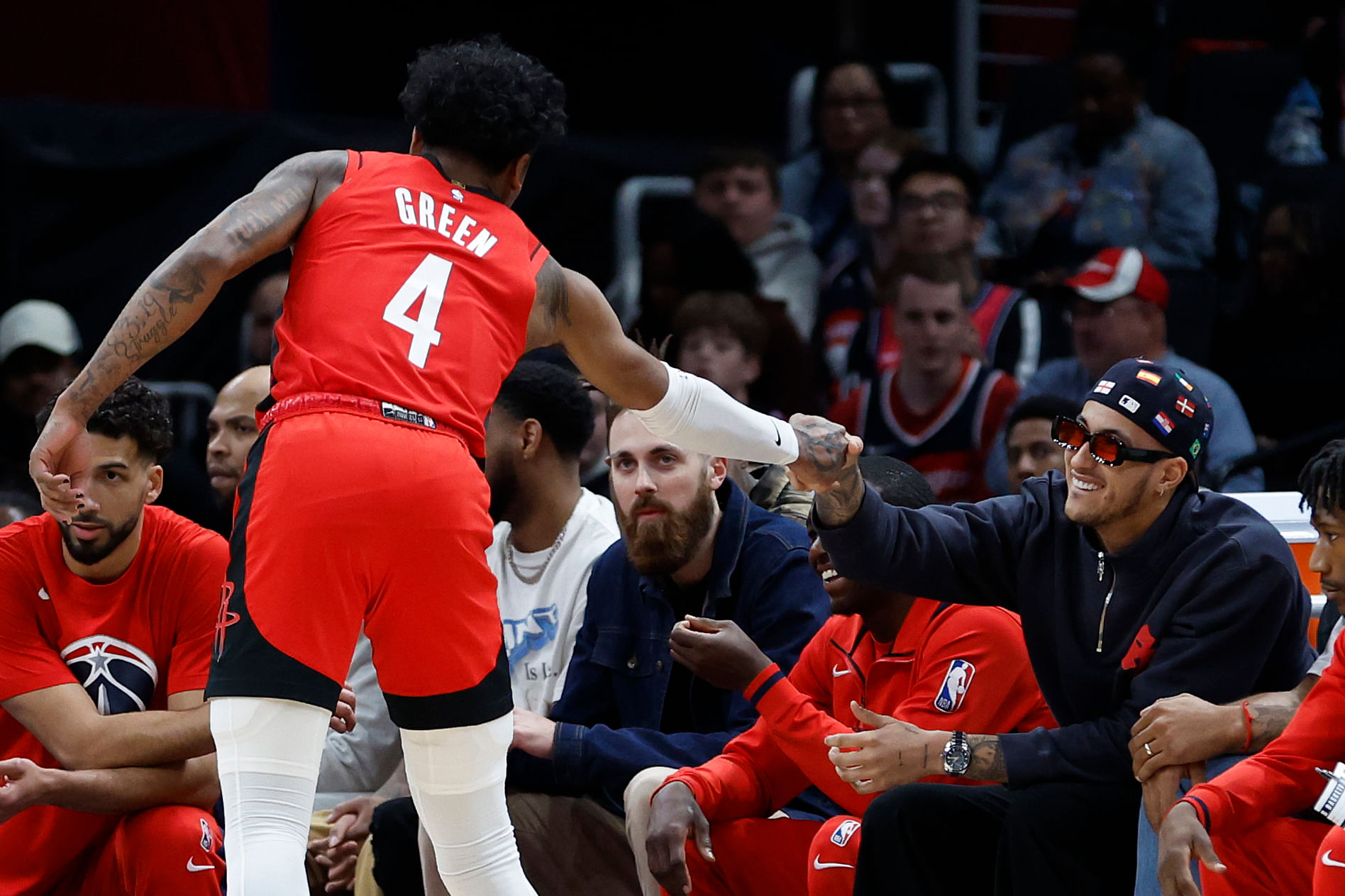 Houston Rockets guard Jalen Green shakes hands with Washington Wizards forward Kyle Kuzma in the second quarter at Capital One Arena. Photo Credit: Imagn