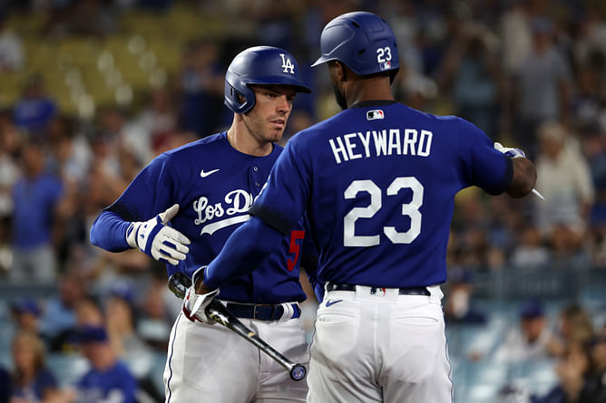 Freddie Freeman celebrates Jason Heyward's clutch 3-run homer that boosted Dodgers' lead over Mariners