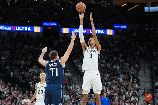 San Antonio Spurs center Victor Wembanyama shooting over Dallas Mavericks guard Luka Doncic - Source: Imagn