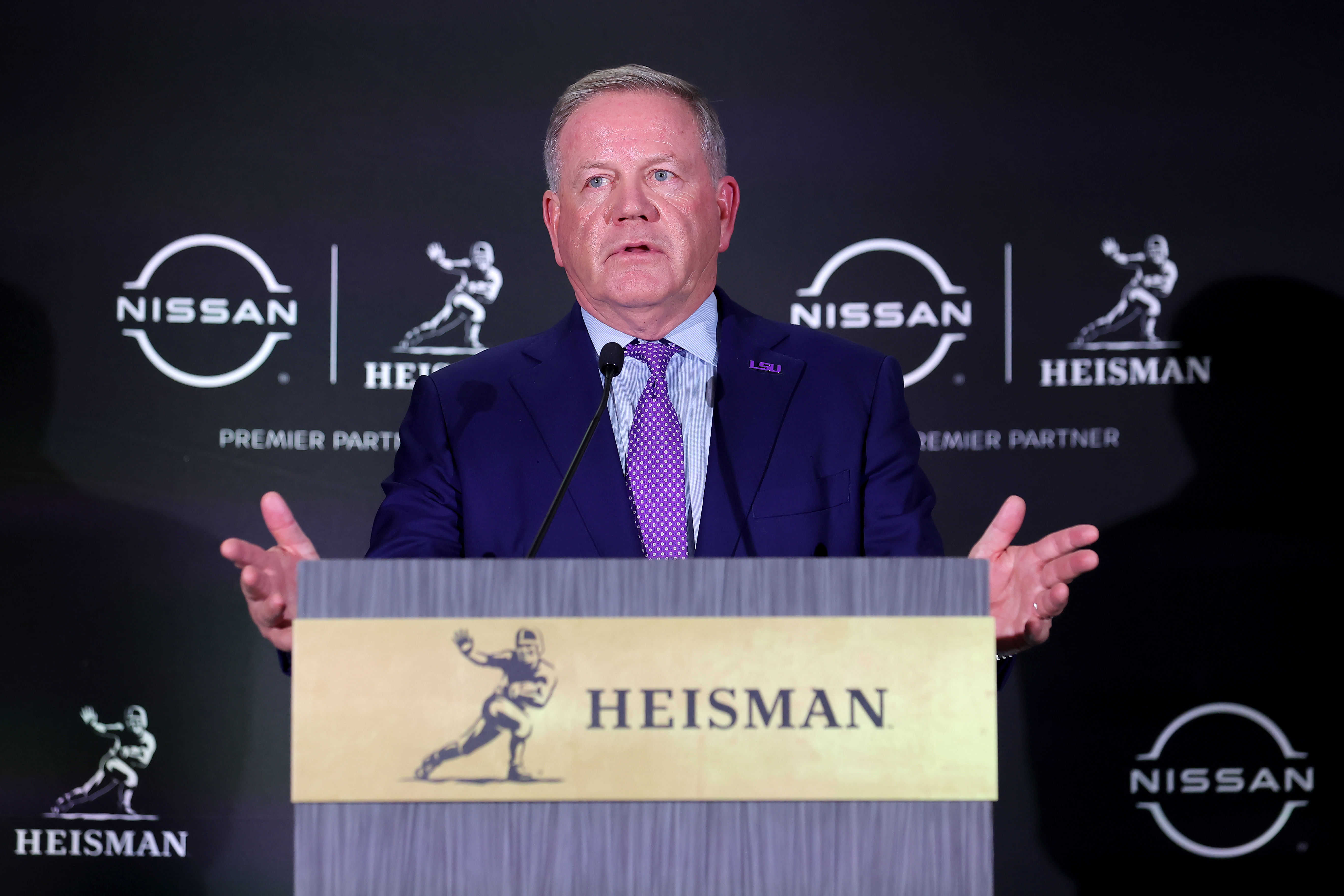 NCAA Football: Heisman Trophy Presentation - Source: Imagn: Dec 9, 2023; New York, New York, USA; LSU head coach Brian Kelly speaks to the media during a press conference in the Astor ballroom at the New York Marriott Marquis after quarterback Jayden Daniels (not pictured) wins the Heisman trophy. Mandatory Credit: Brad Penner-USA TODAY Sports