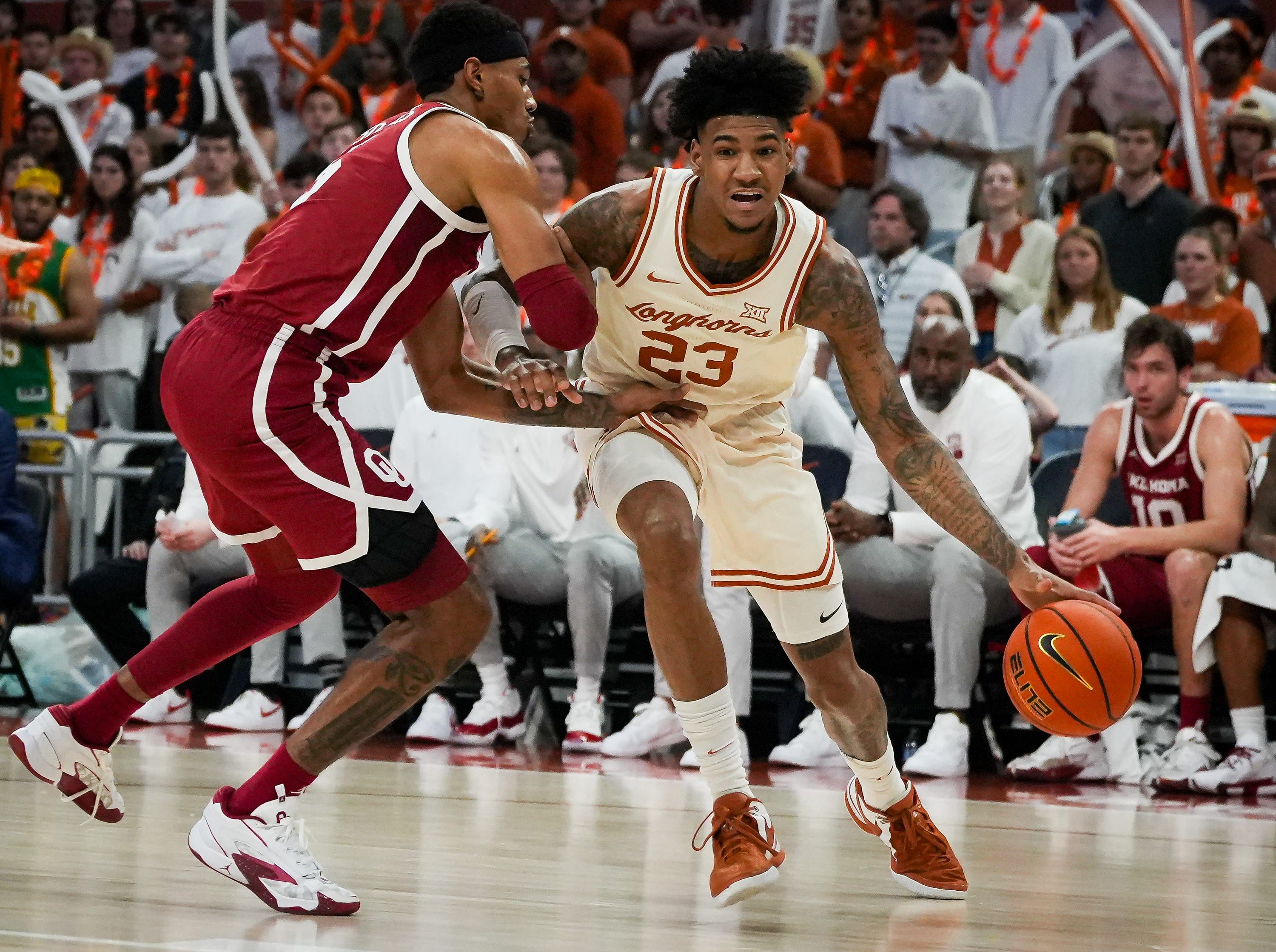 Cincinnati forward Dillon Mitchell transferred to the Bearcats after two seasons with Texas (Image Source: IMAGN)