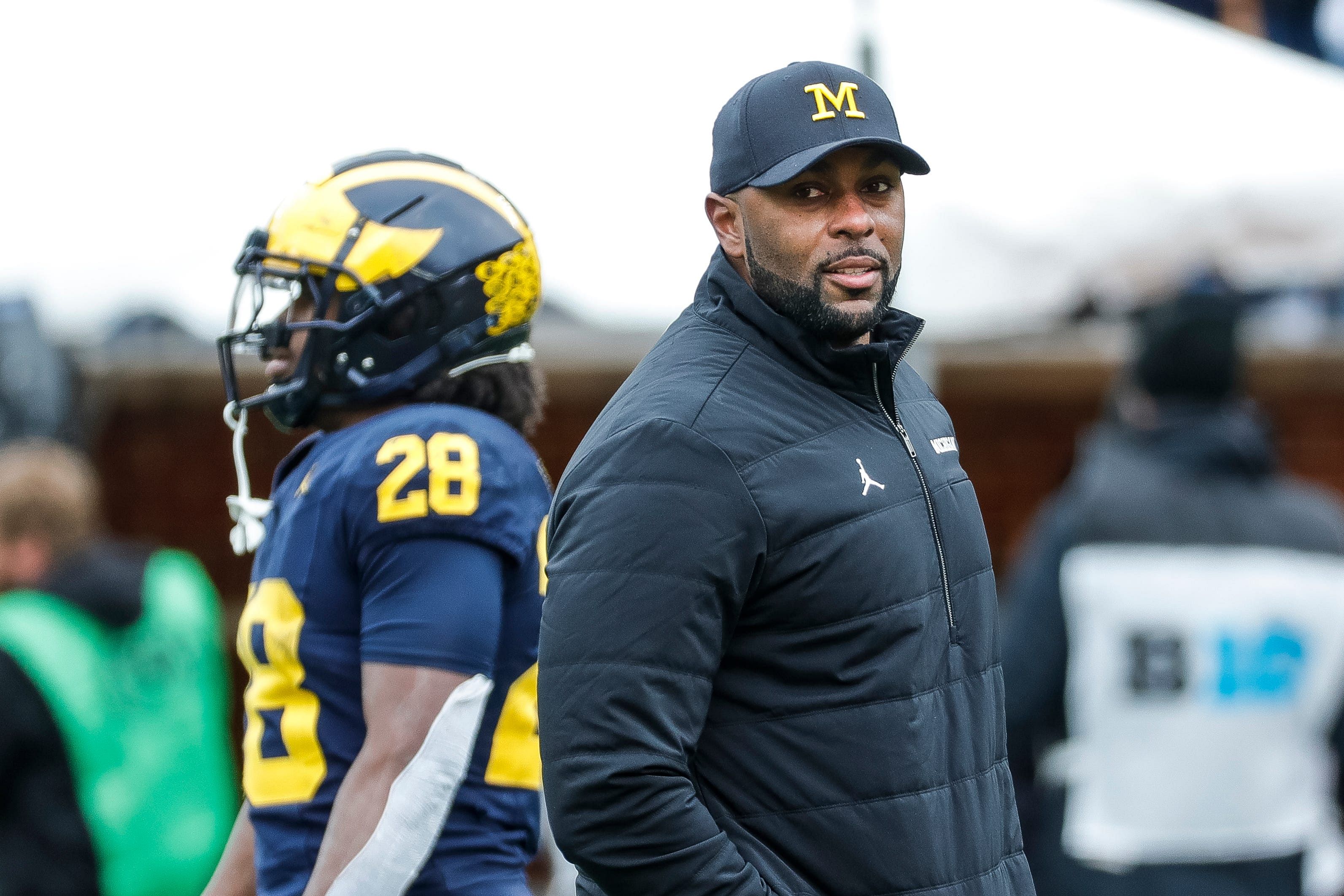 Michigan head coach Sherrone Moore watches a play - Image source: Imagn