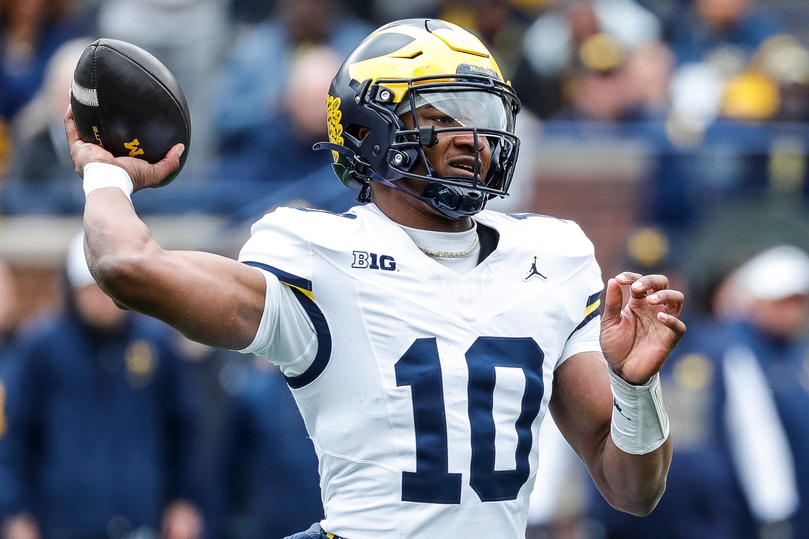 Michigan QB Alex Orji is athletic but unexperienced as he battles for the starting QB nod. (Photo credit: IMAGN)