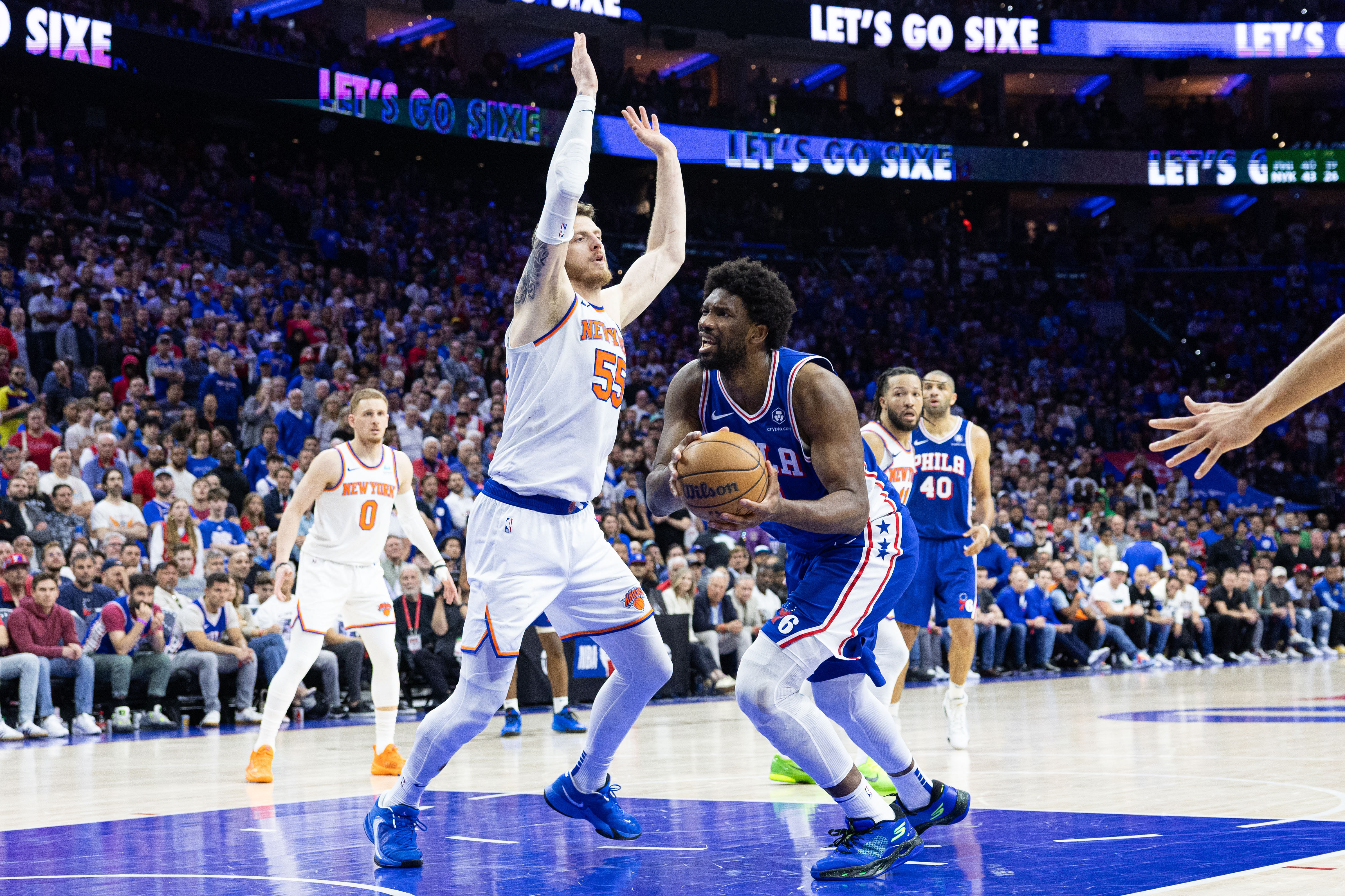 Philadelphia 76ers center Joel Embiid drives for a shot against New York Knicks center Isaiah Hartenstein during the first round for the 2024 NBA playoffs at Wells Fargo Center. Photo Credit: Imagn