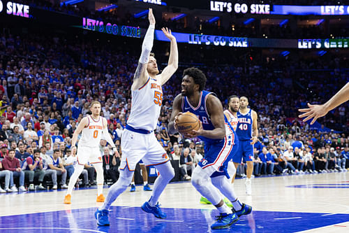 Philadelphia 76ers center Joel Embiid drives for a shot against New York Knicks center Isaiah Hartenstein during the first round for the 2024 NBA playoffs at Wells Fargo Center. Photo Credit: Imagn