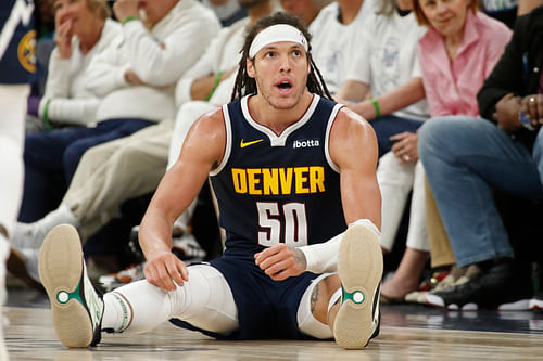 Denver Nuggets forward Aaron Gordon sits after drawing a foul from the Minnesota Timberwolves during a game at the Target Center. Photo Credit: Imagn