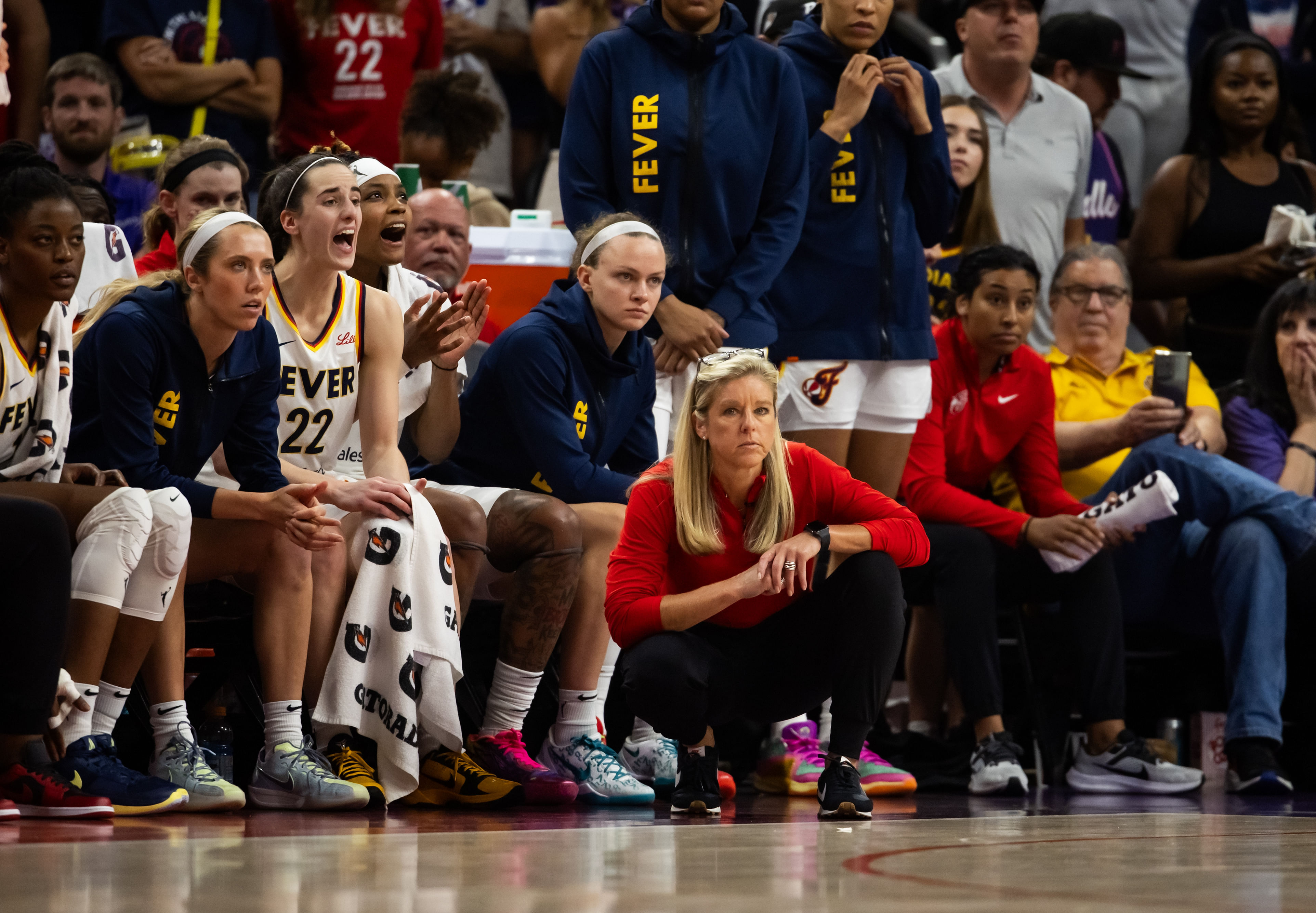 Indiana Fever head coach Christie Sides against the Phoenix Mercury during a WNBA game at Footprint Center. Photo Credit: Imagn