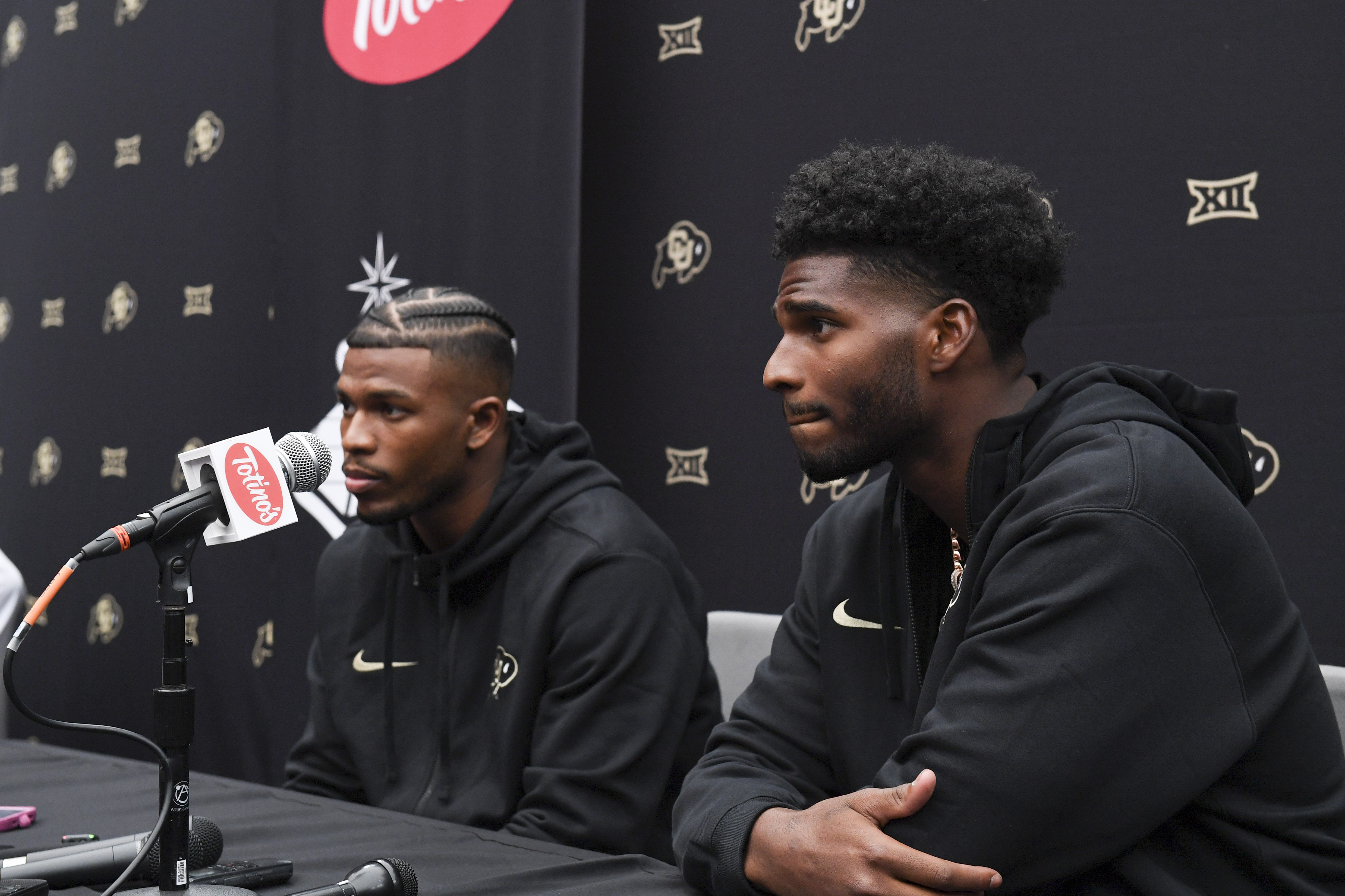 Colorado Buffaloes safety Shilo Sanders and quarterback Shedeur Sanders speak to the media. Mandatory Credit: Candice Ward-USA TODAY Sports, IMAGN