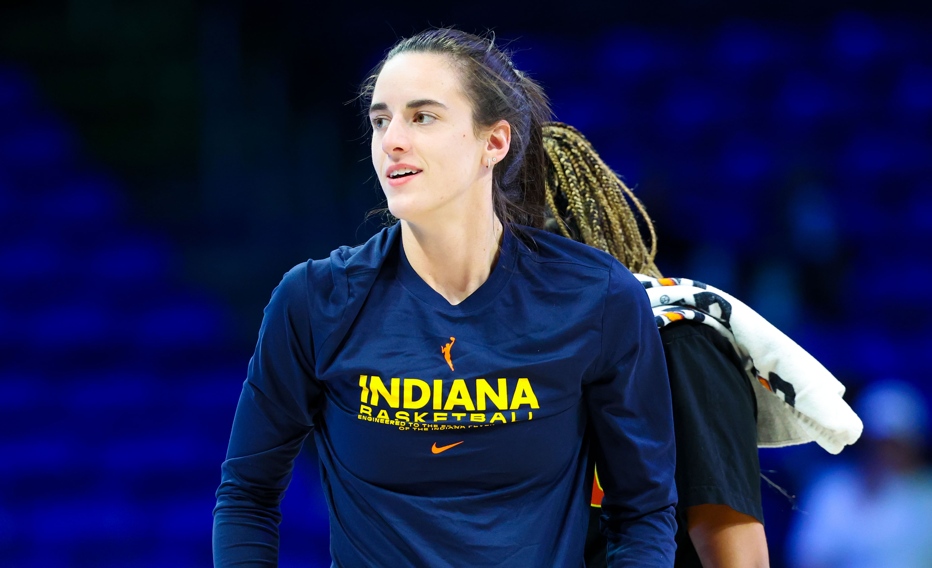 Indiana Fever guard Caitlin Clark warms up before the game against the Dallas Wings at College Park Center. Photo Credit: Imagn