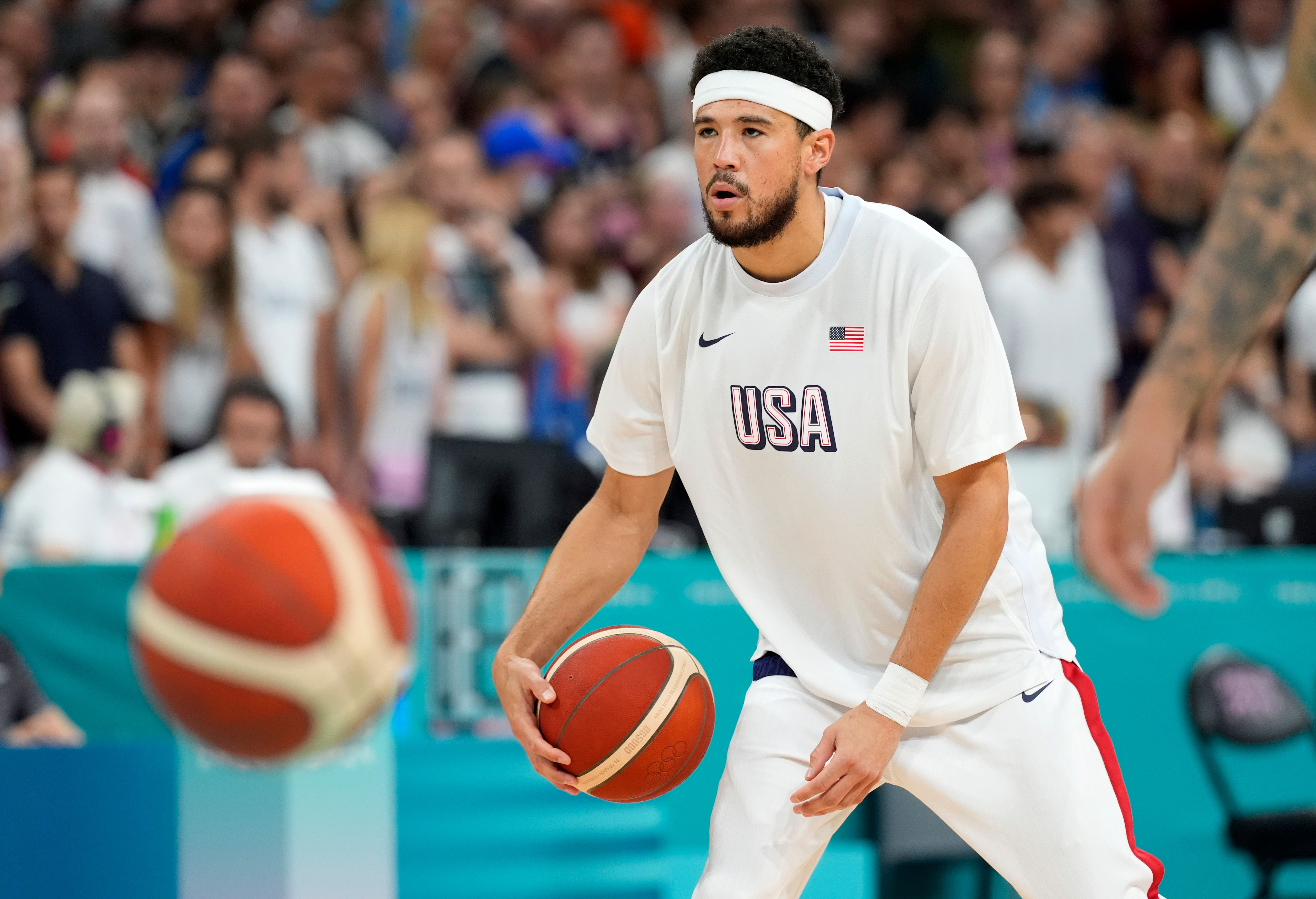 Devin Booker reacts to his performance against Brazil. (Photo: IMAGN)