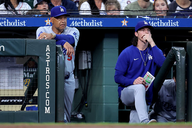 WATCH: Dodgers' Dave Roberts gets ejected after heated exchange with umpire over controversial defensive interference call