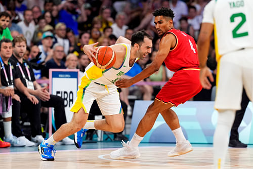 Brazil shooting guard Vitor Benite drives to the basket against Germany at the Paris Olympics basketball event at Stade Pierre-Mauroy. Photo Credit: Imagn