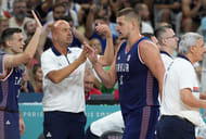 Serbia's Nikola Jokic celebrates with coaches and teammates after a play against Puerto Rico during the Paris Olympics basketball event at Stade Pierre-Mauroy (Photo Credit: Imagn)