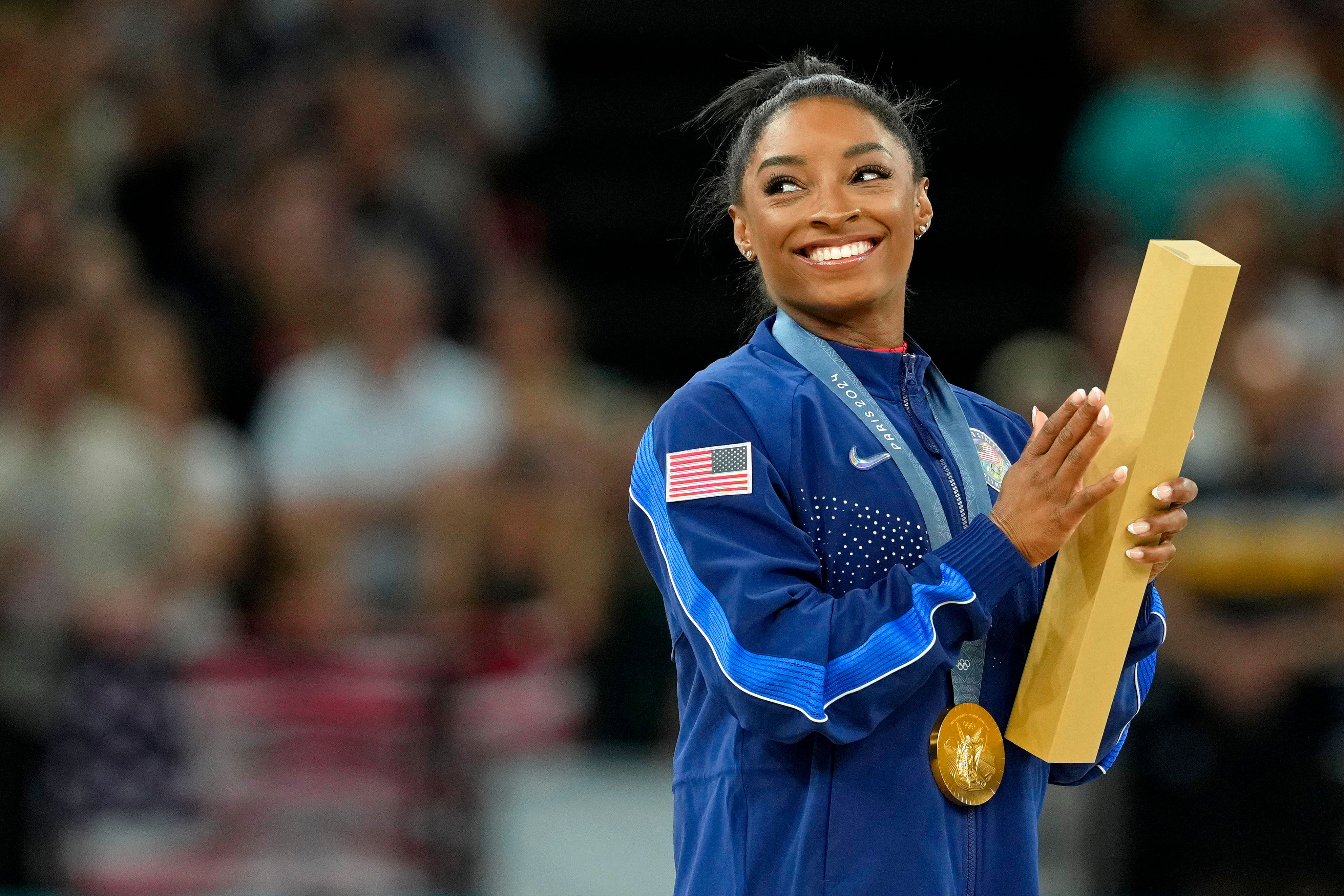 Tom Brady watched Simone Biles (Imagn)