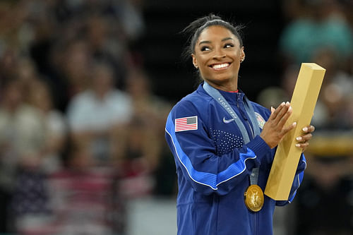 Tom Brady watched Simone Biles (Imagn)