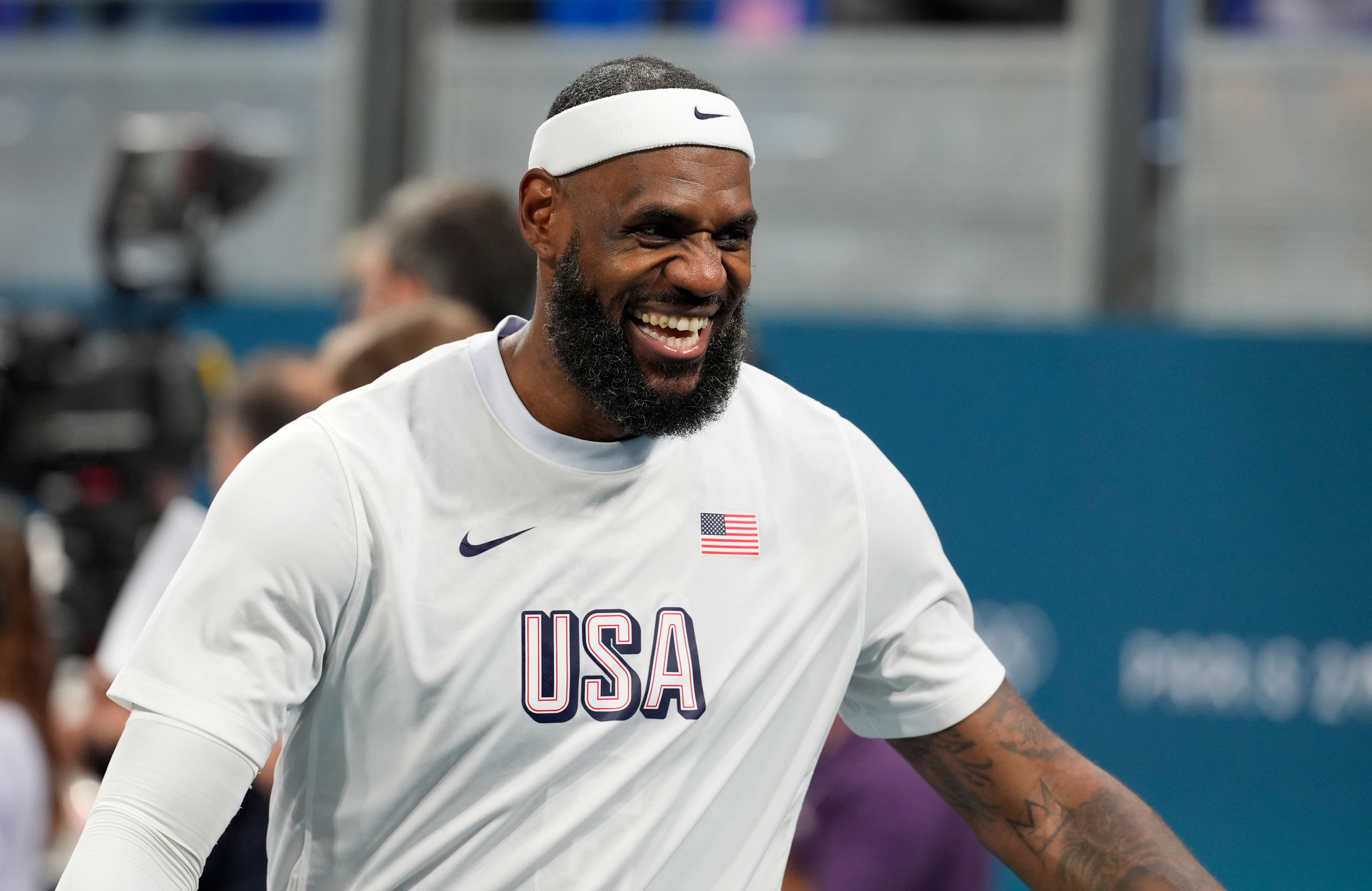 United States guard LeBron James celebrates after defeating Puerto Rico at the Olympics basketball competition at Stade Pierre-Mauroy. (image credit: Imagn)