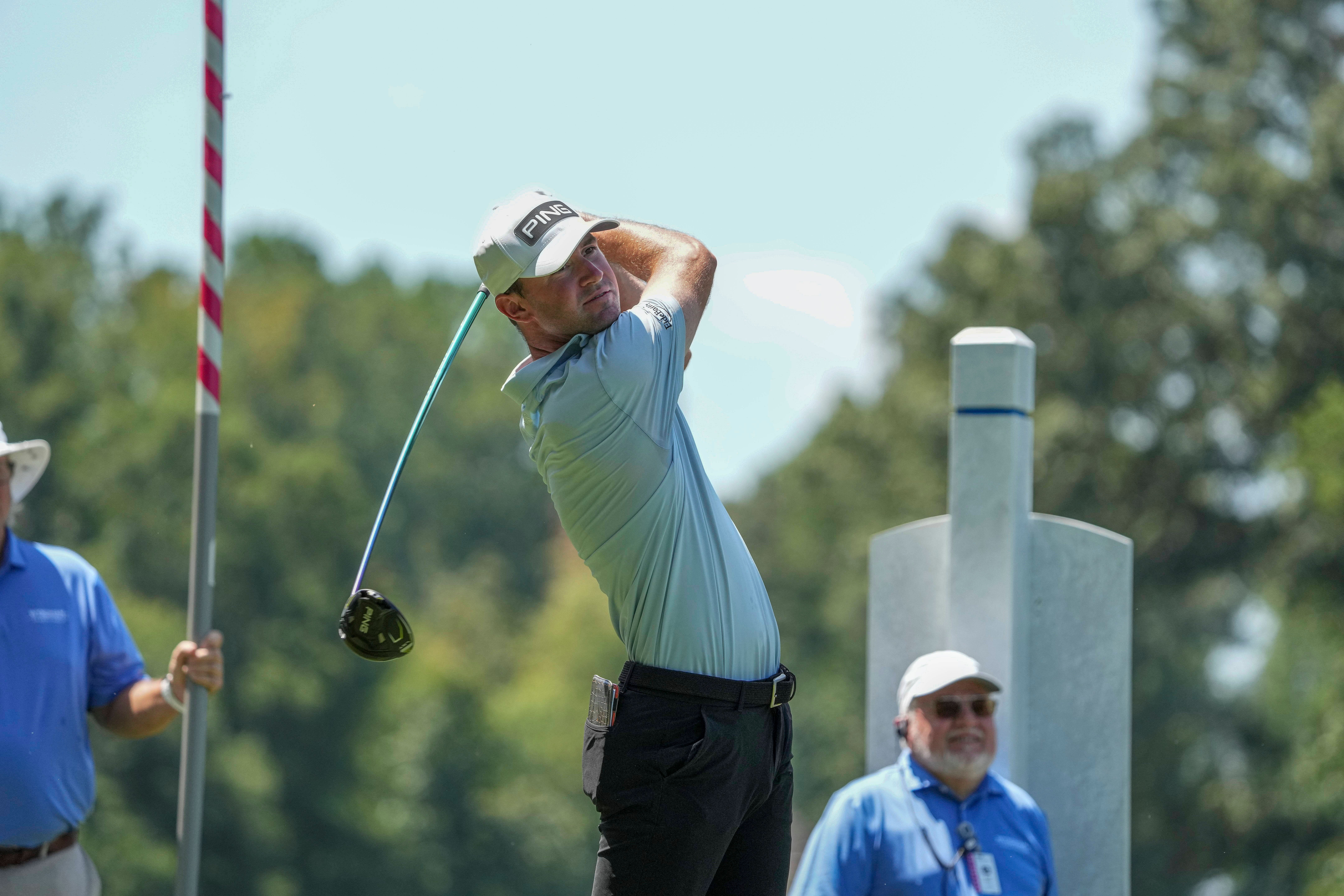 Austin Eckroat plays a shot on the 15th hole during the first round of the Wyndham Championship (Photo via IMAGN)