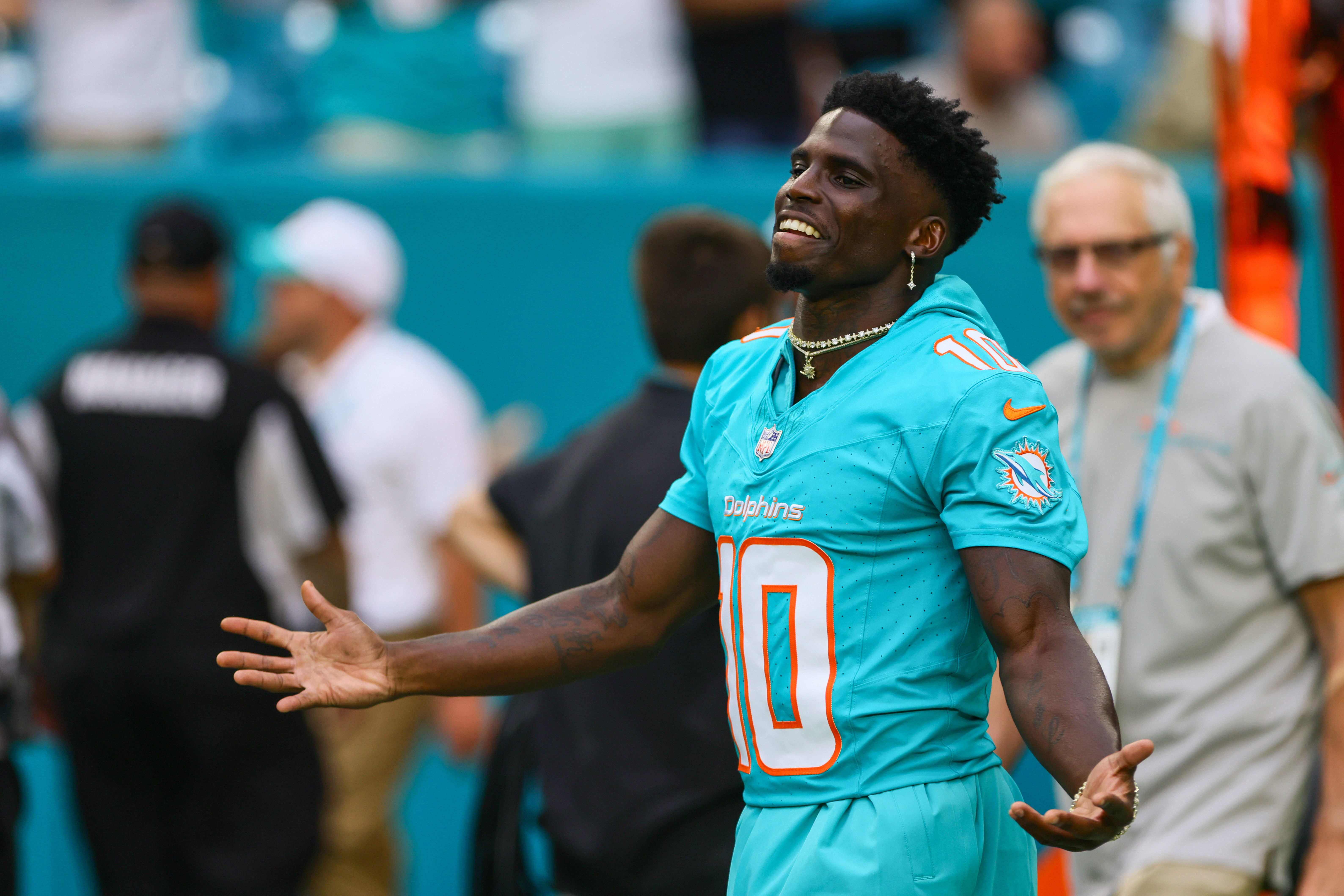 Miami Dolphins wide receiver Tyreek Hill reacts as he walks on the field before the game against the Atlanta Falcons. Photo Credit: Imagn