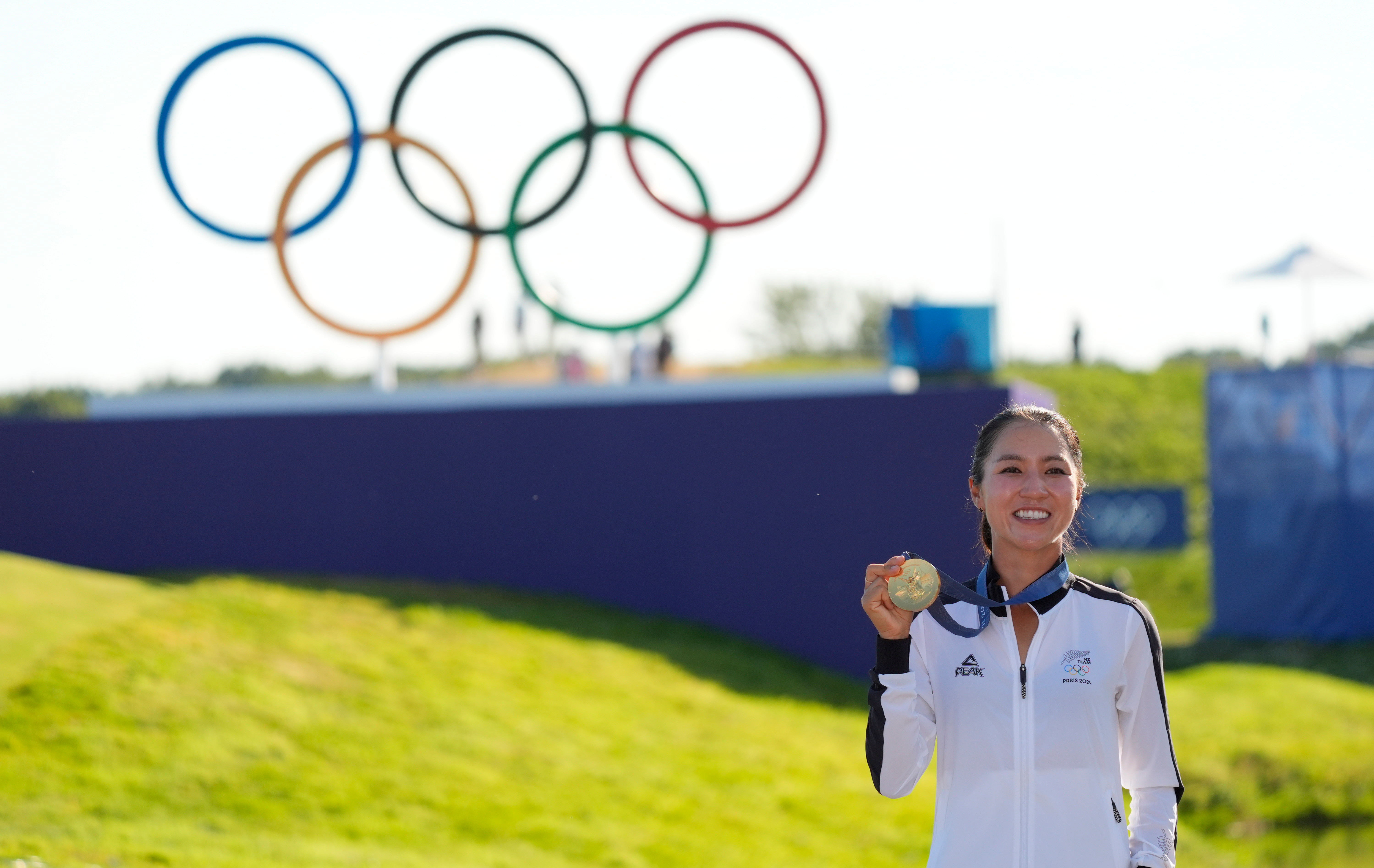 How much did Lydia Ko earn for winning a gold medal at the Paris Olympics?