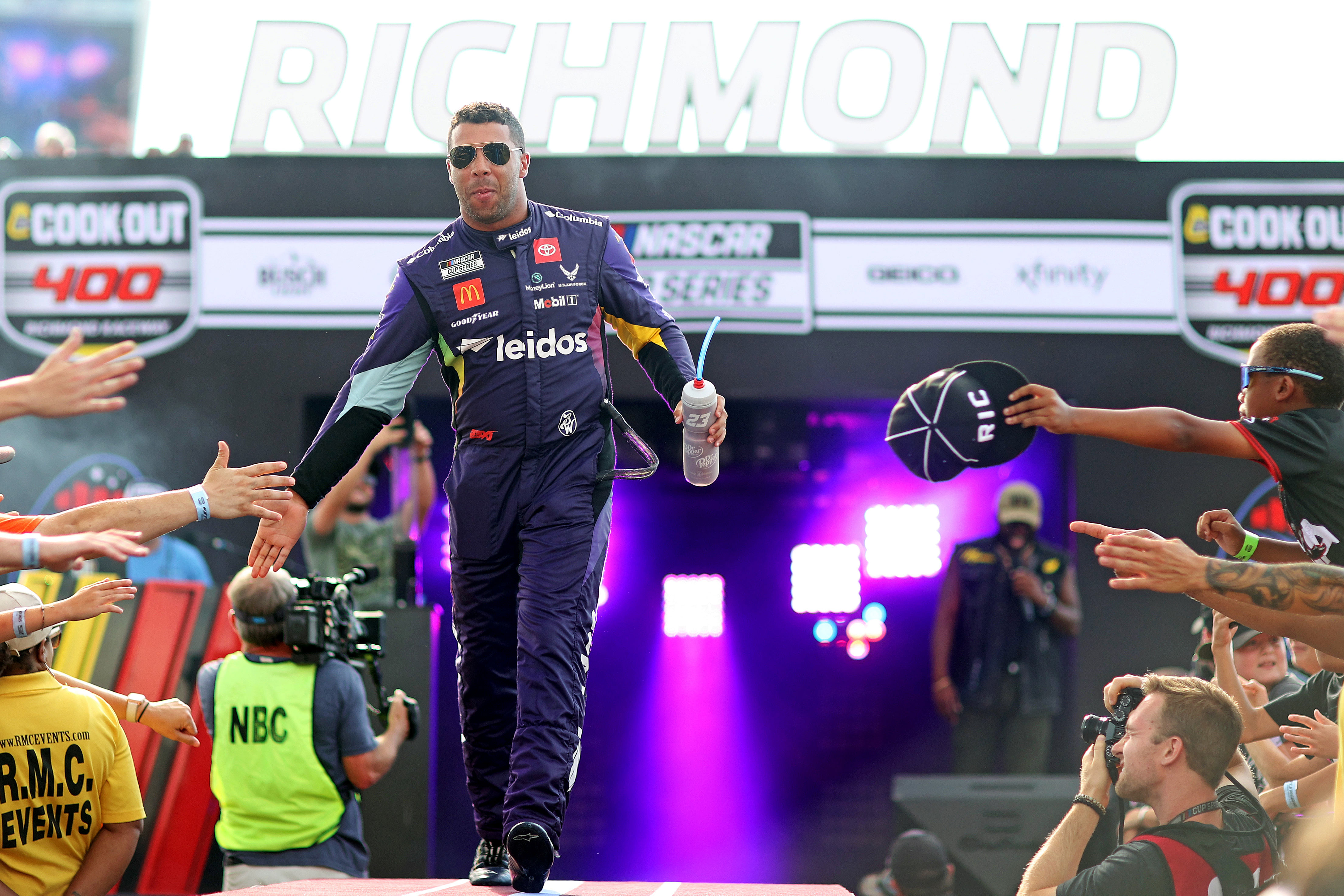 NASCAR Cup Series driver Bubba Wallace (23) during driver introductions before the Cook Out 400 at Richmond Raceway (Source: IMAGN)