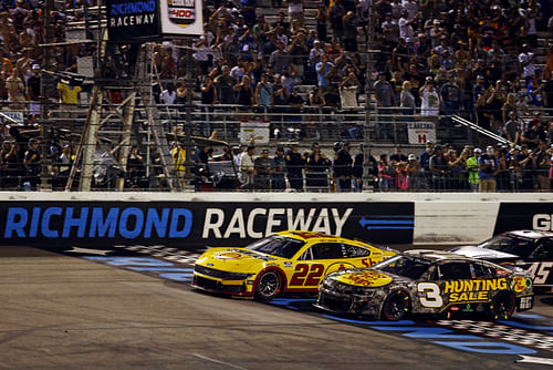 Joey Logano (22) and NASCAR Cup Series driver Austin Dillion (3) restart the race for overtime during the Cook Out 400 at Richmond Raceway. Mandatory Credit: Peter Casey-USA TODAY Sports. Source: Imagn