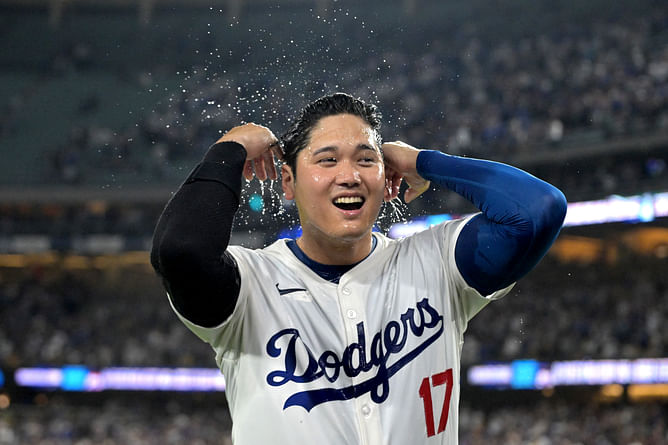 Dodgers superstar Shohei Ohtani rocks casual weekend look in white shorts, flip-flops & a fresh haircut