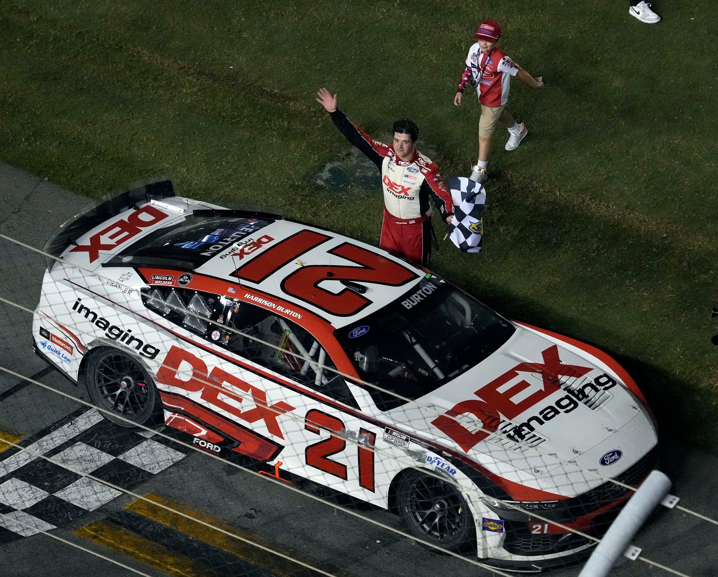 Harrison Burton celebrates winning the NASCAR Coke Zero Sugar 400 at Daytona International Speedway, Saturday, Aug. 24, 2024. Source: Imagn