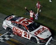 Harrison Burton celebrates winning the NASCAR Coke Zero Sugar 400 at Daytona International Speedway, Saturday, Aug. 24, 2024. Source: Imagn
