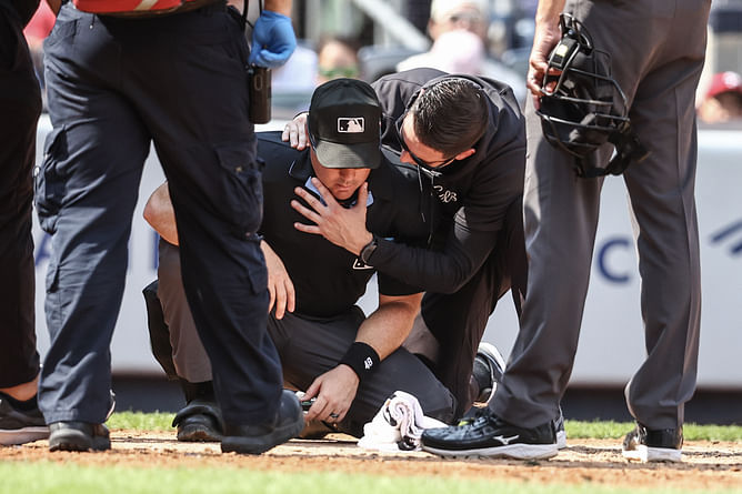 WATCH: MLB umpire Nick Mahrley gets hit by splintered bat from Giancarlo Stanton