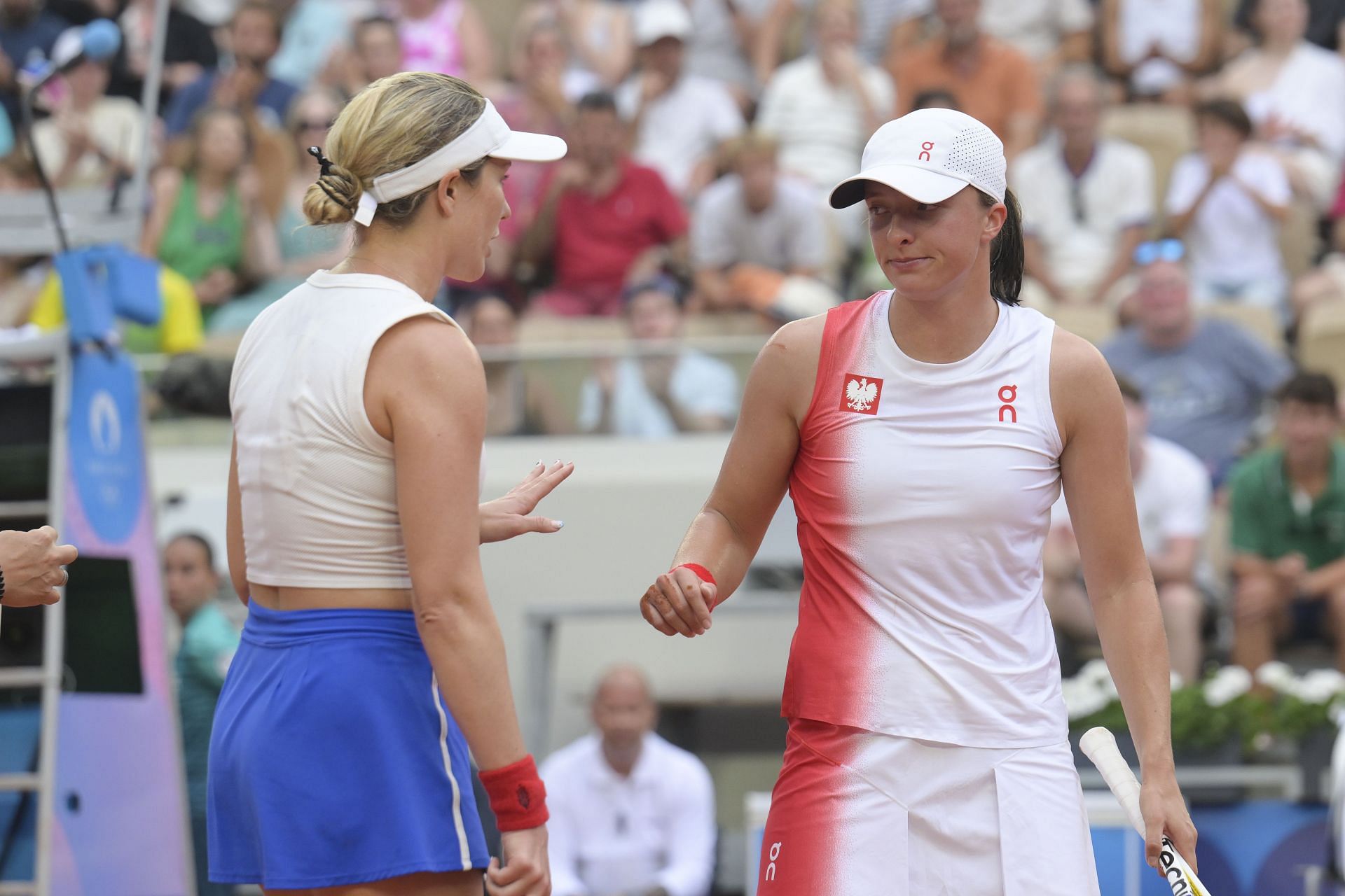 Danielle Collins (L) and Iga Swiatek (R) at Paris Olympics 2024 [Source: Getty]