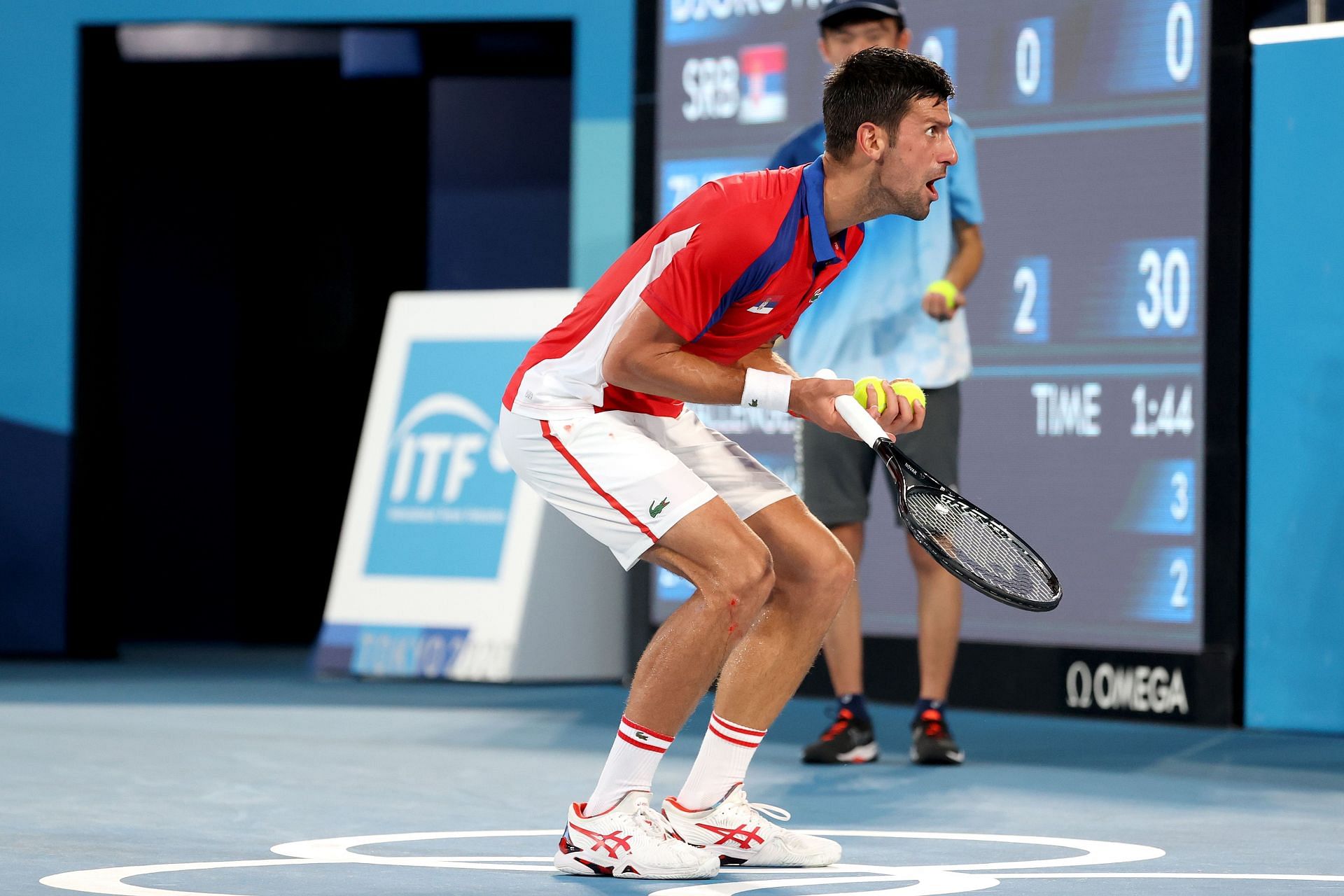 Novak Djokovic screams during his Olympic semifinal at Tokyo 2020 (Getty)