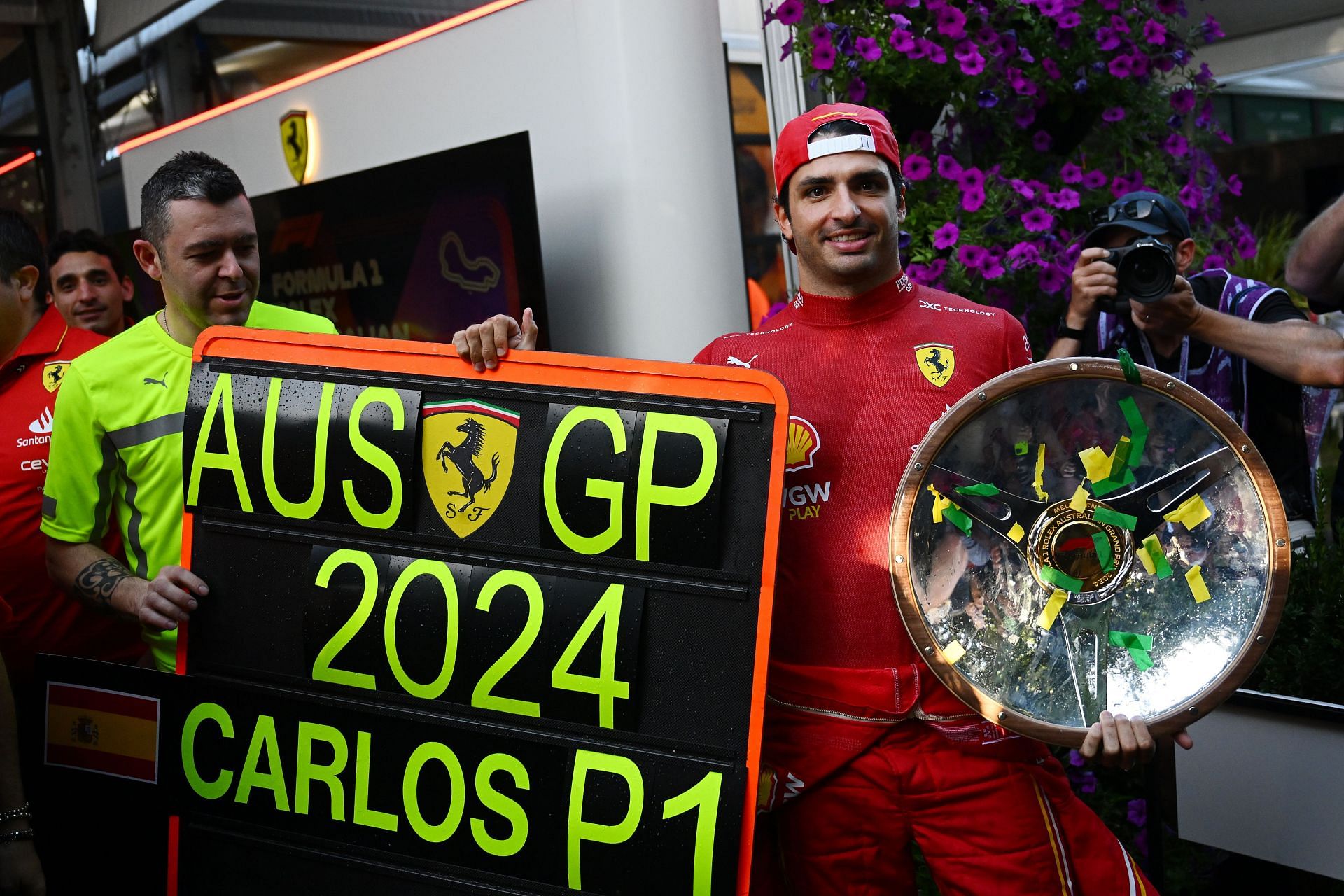 Carlos Sainz of Spain and Ferrari celebrates with his team following the F1 Grand Prix of Australia - Getty Images