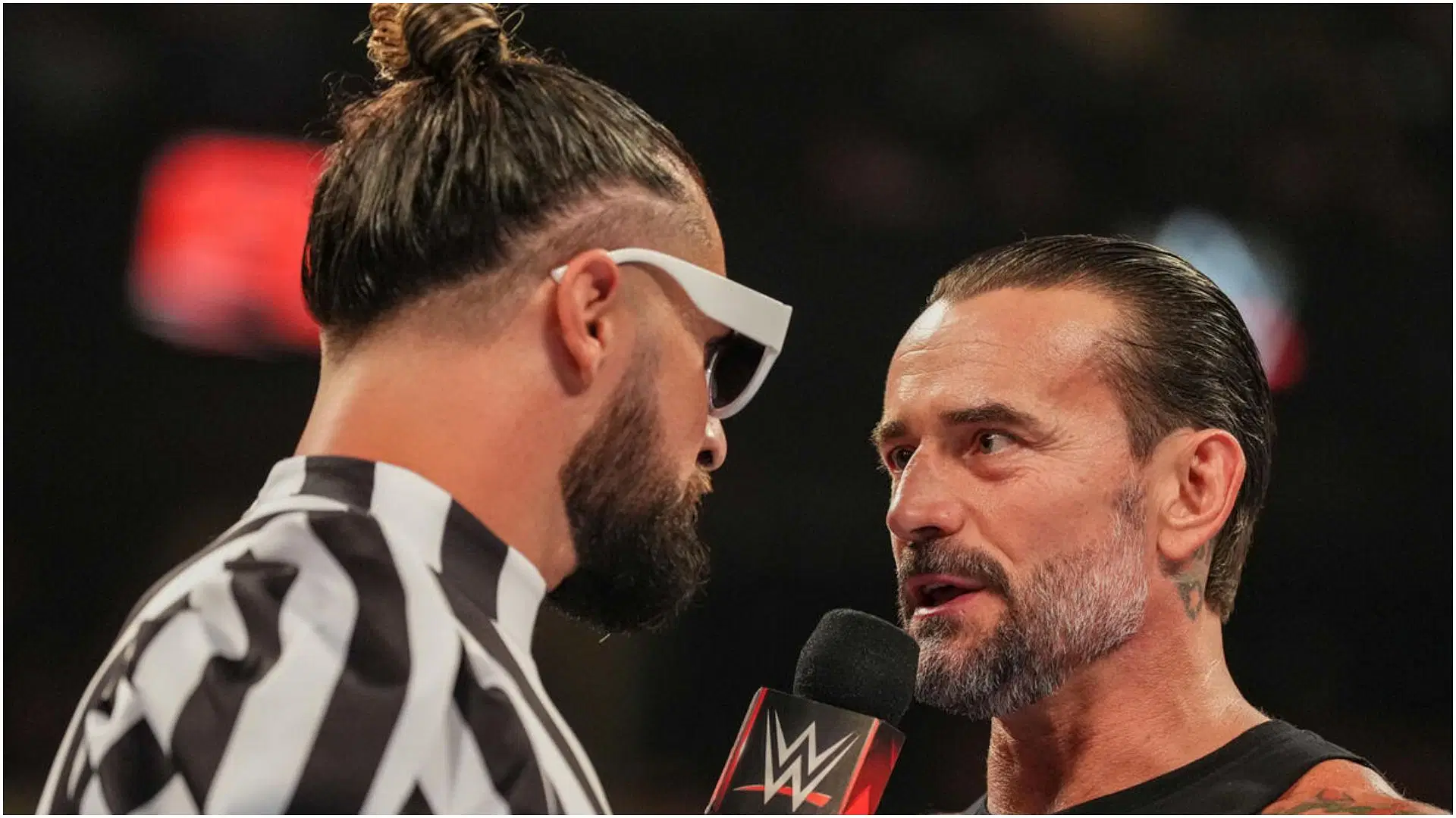 CM Punk and Seth Rollins on an episode of WWE RAW. [Photo via: WWE.com]