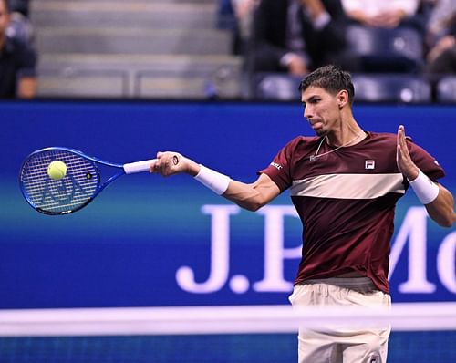 Alexei Popyrin in action against Novak Djokovic at the US Open.