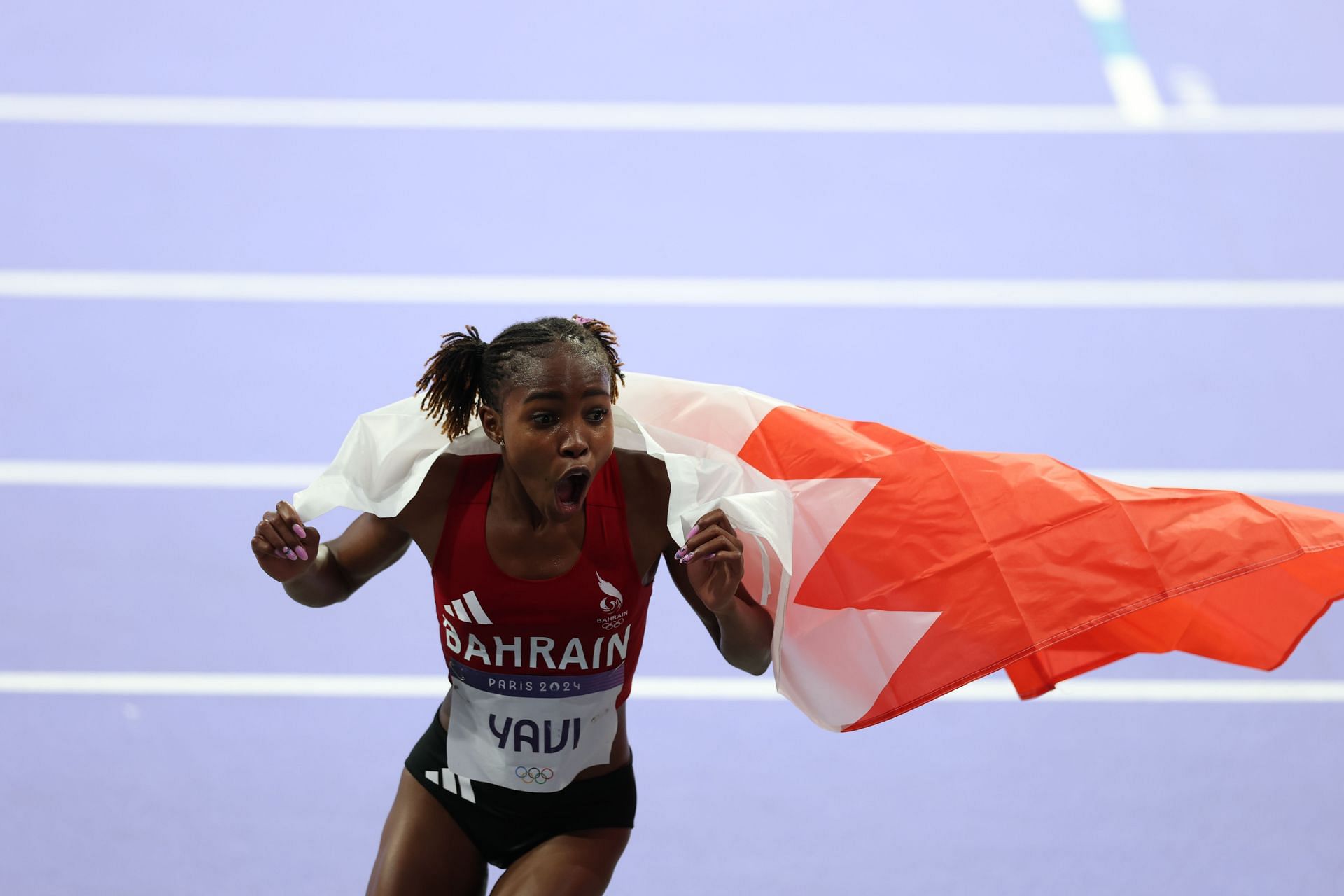 Winfred Yavi of Bahrain celebrates her victory in the women&#039;s 3000m Steeplechase [Image Source: Getty]