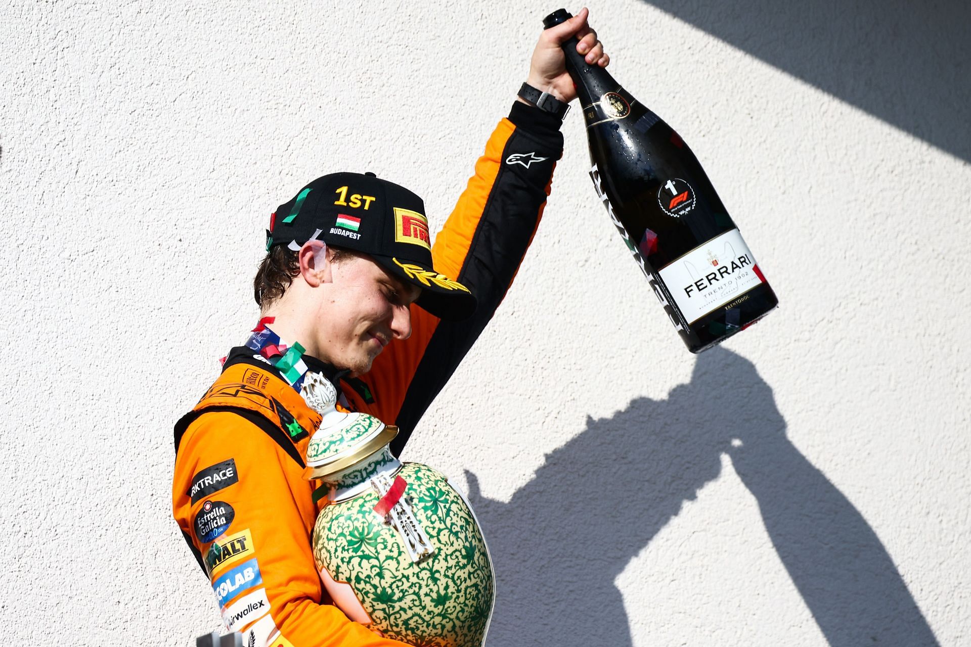 Oscar Piastri of McLaren celebrates on the podium (GETTY)