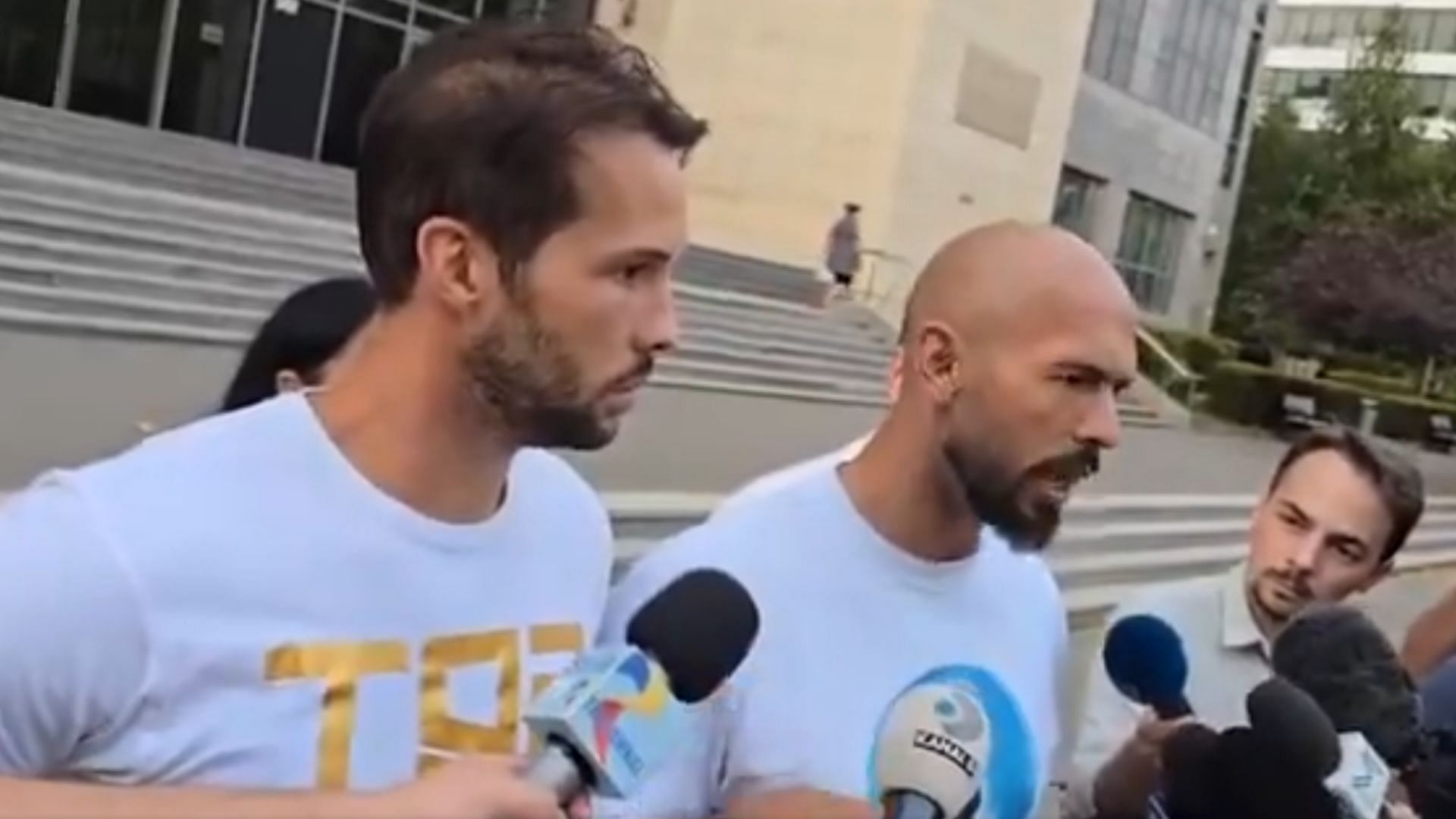 Andrew Tate appeared furious while talking to the press after his hearing at a Romanian court (Image via @_mirceabarbu/X)