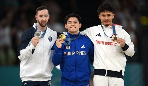 Yulo (centre) at the Paris 2024 Olympic Games Source: Getty